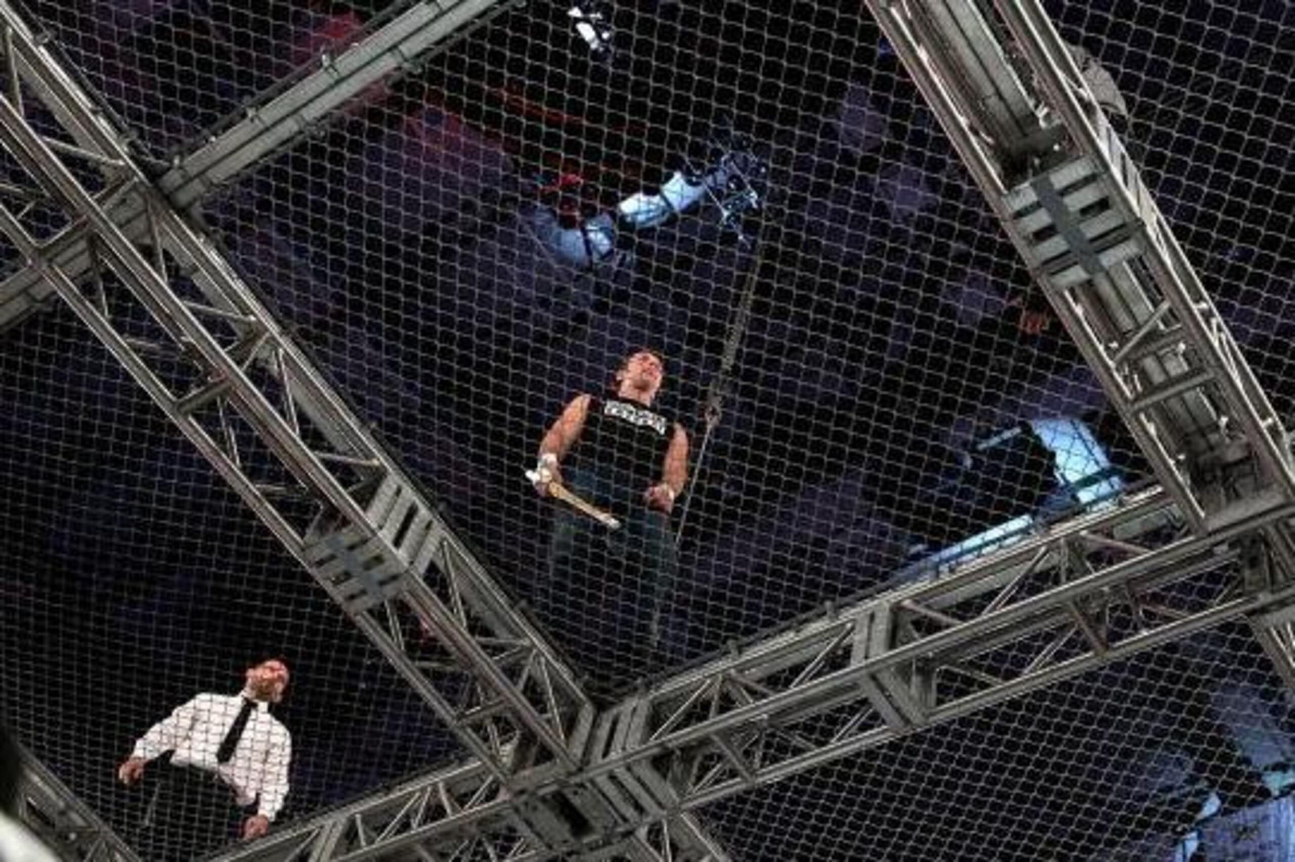Dean Ambrose waits on top of The Cell.
