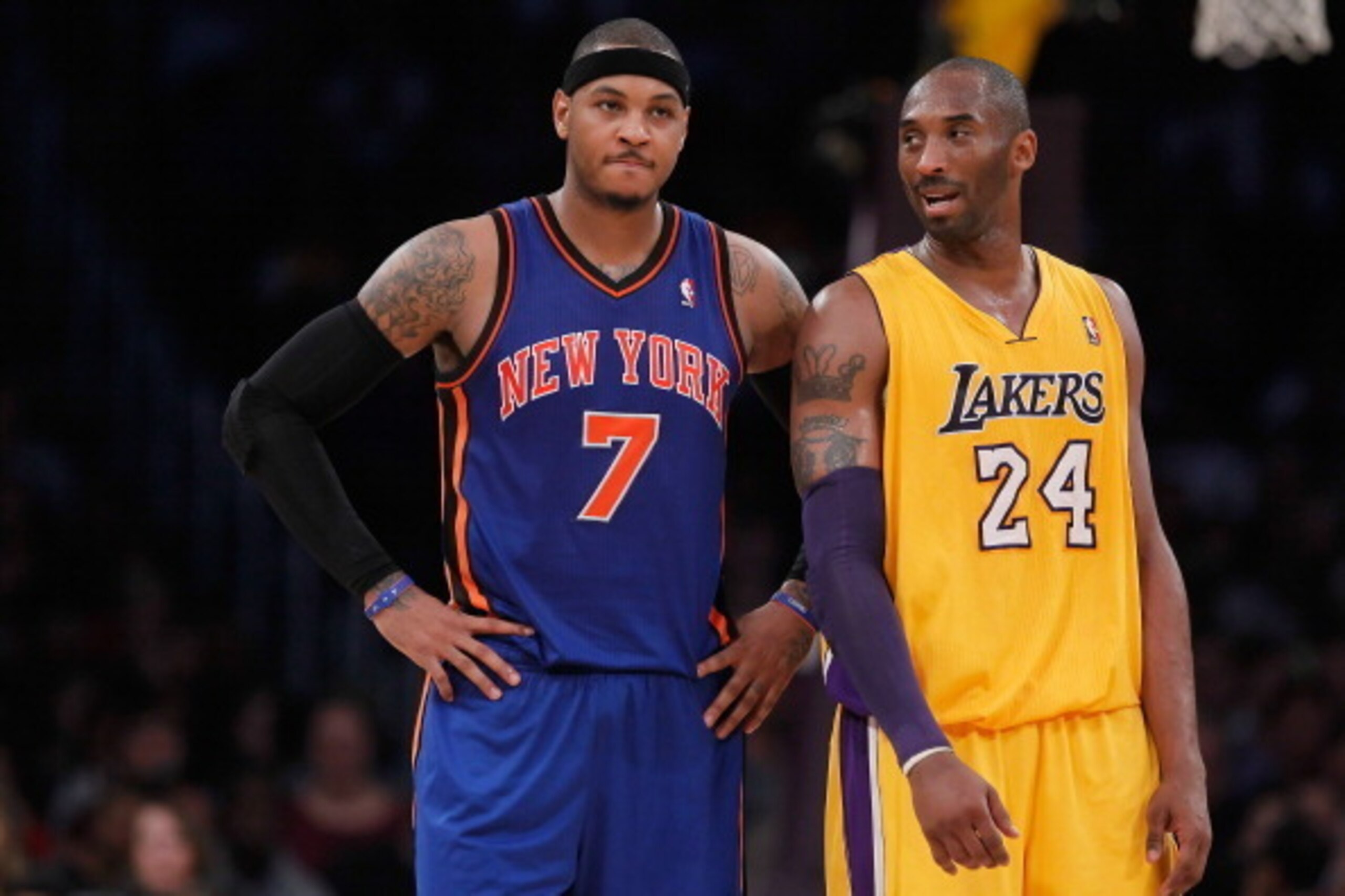 LOS ANGELES, CA - DECEMBER 29:  Carmelo Anthony #7 of the New York Knicks and Kobe Bryant #24 of the Los Angeles Lakers talk during the first half at Staples Center on December 29, 2011 in Los Angeles, California. NOTE TO USER: User expressly acknowledges