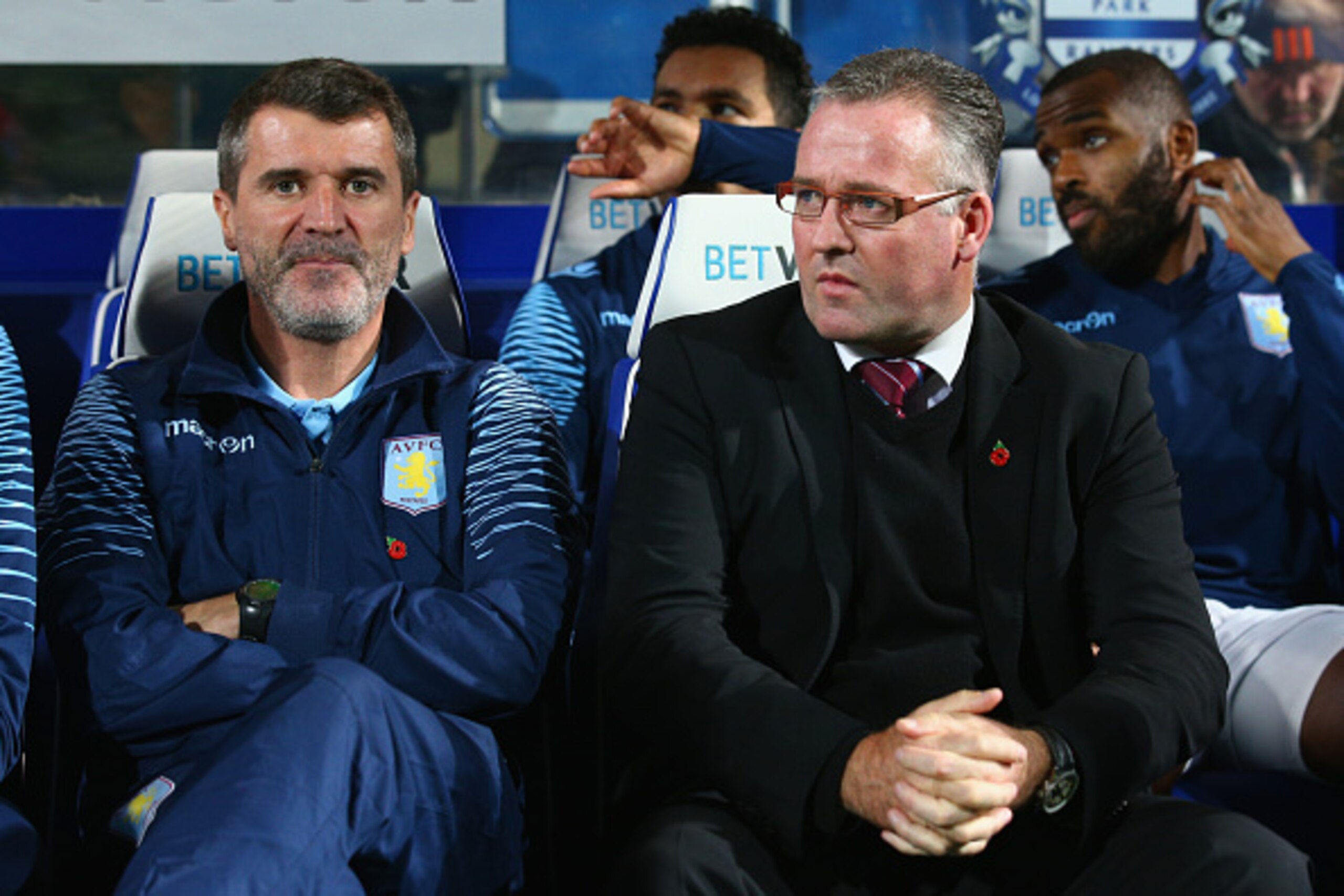 LONDON, ENGLAND - OCTOBER 27: Roy Keane, Aston Villa assistant manager and Manager Paul Lambert of Aston Villa in the dug out during the Barclays Premier League match between Queens Park Rangers and Aston Villa at Loftus Road on October 27, 2014 in London