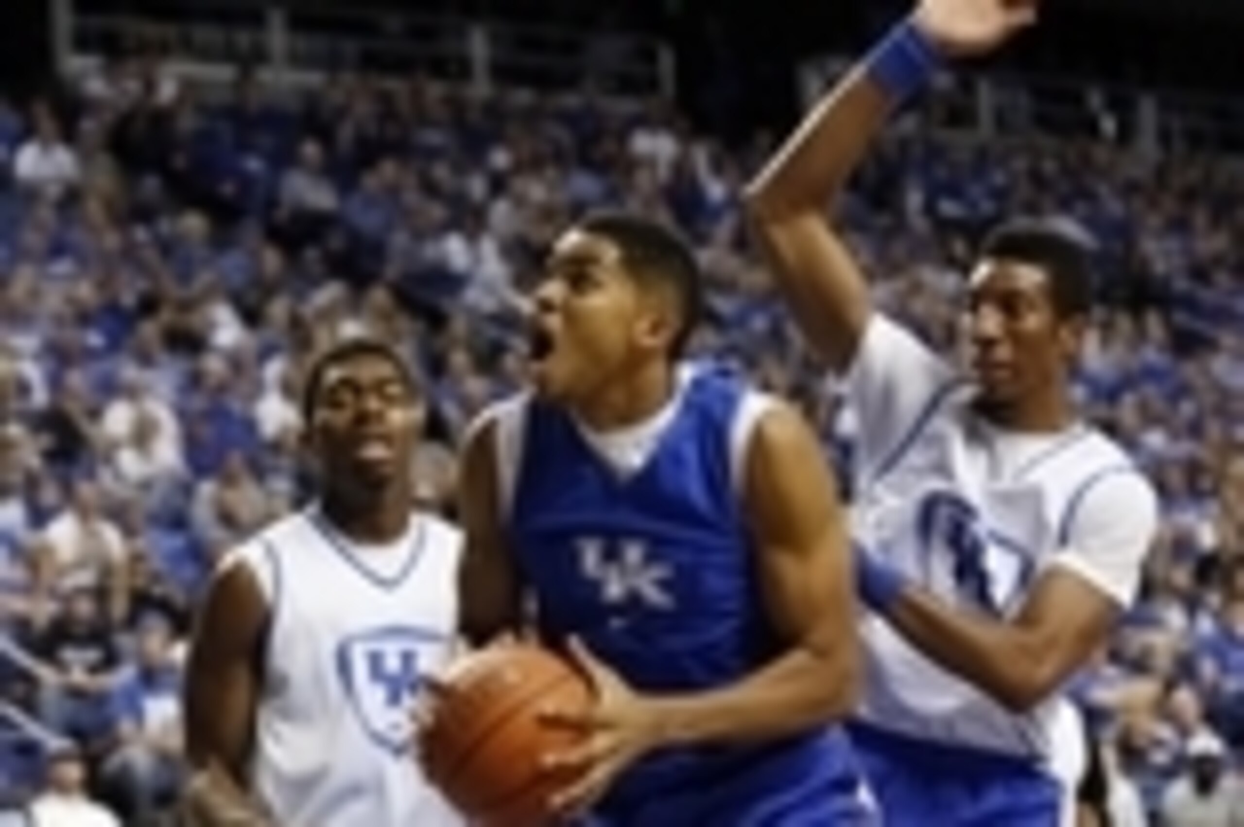 Oct 27, 2014; Lexington, KY, USA; Kentucky Wildcats forward Karl-Anthony Towns (12) shoots the ball against forward Marcus Lee (00) during the Blue-White Scrimmage at Rupp Arena. Mandatory Credit: Mark Zerof-USA TODAY Sports
