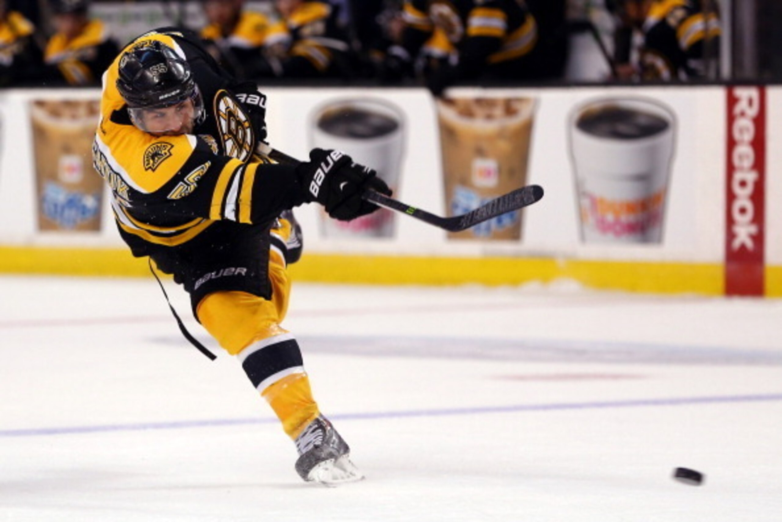 BOSTON, MA - MARCH 01:  Johnny Boychuk #55 of the Boston Bruins takes a shot against the Washington Capitals during a game at the TD Garden on March 1, 2014 in Boston, Massachusetts.  (Photo by Alex Trautwig/Getty Images)
