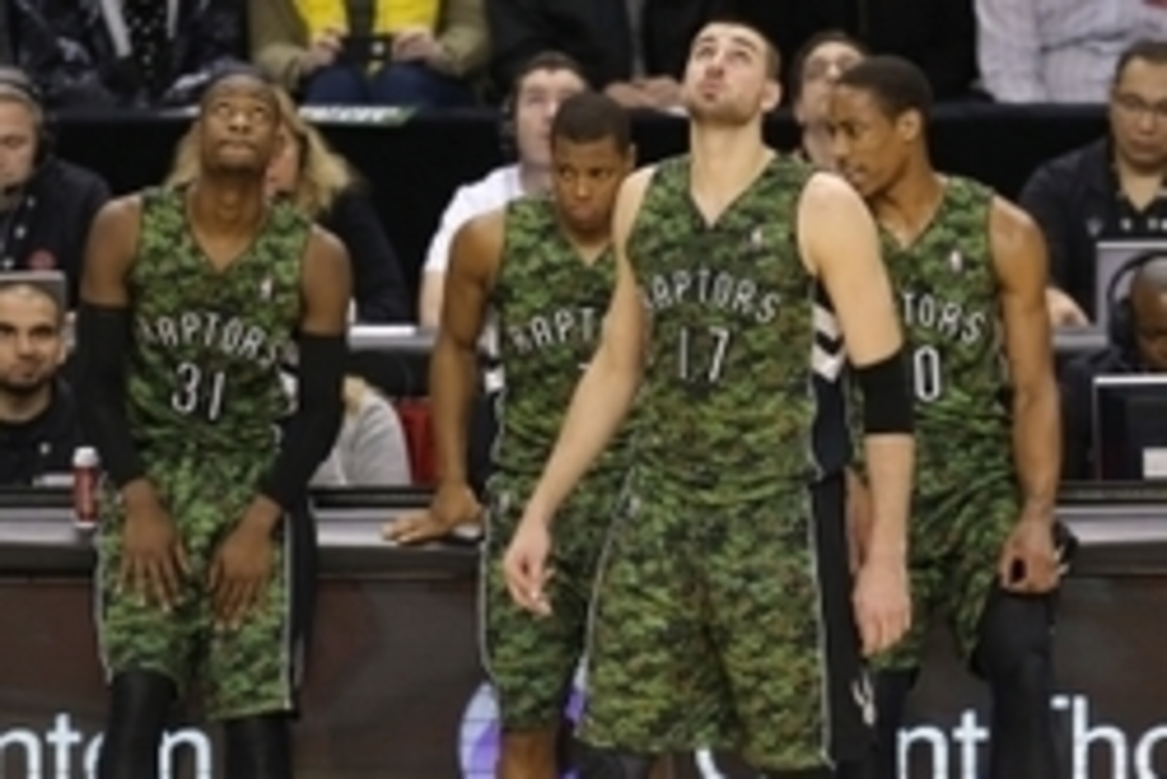 Jan 17, 2014; Toronto, Ontario, CAN; Toronto Raptors guard Terrence Ross (31) and point guard Kyle Lowry (7) and center Jonas Valanciunas (17) and guard DeMar DeRozan (10) wear their camo jerseys on Forces Night against the Minnesota Timberwolves at Air C Jan 17, 2014; Toronto, Ontario, CAN; Toronto Raptors guard Terrence Ross (31) and point guard Kyle Lowry (7) and center Jonas Valanciunas (17) and guard DeMar DeRozan (10) wear their camo jerseys on Forces Night against the Minnesota Timberwolves at Air C