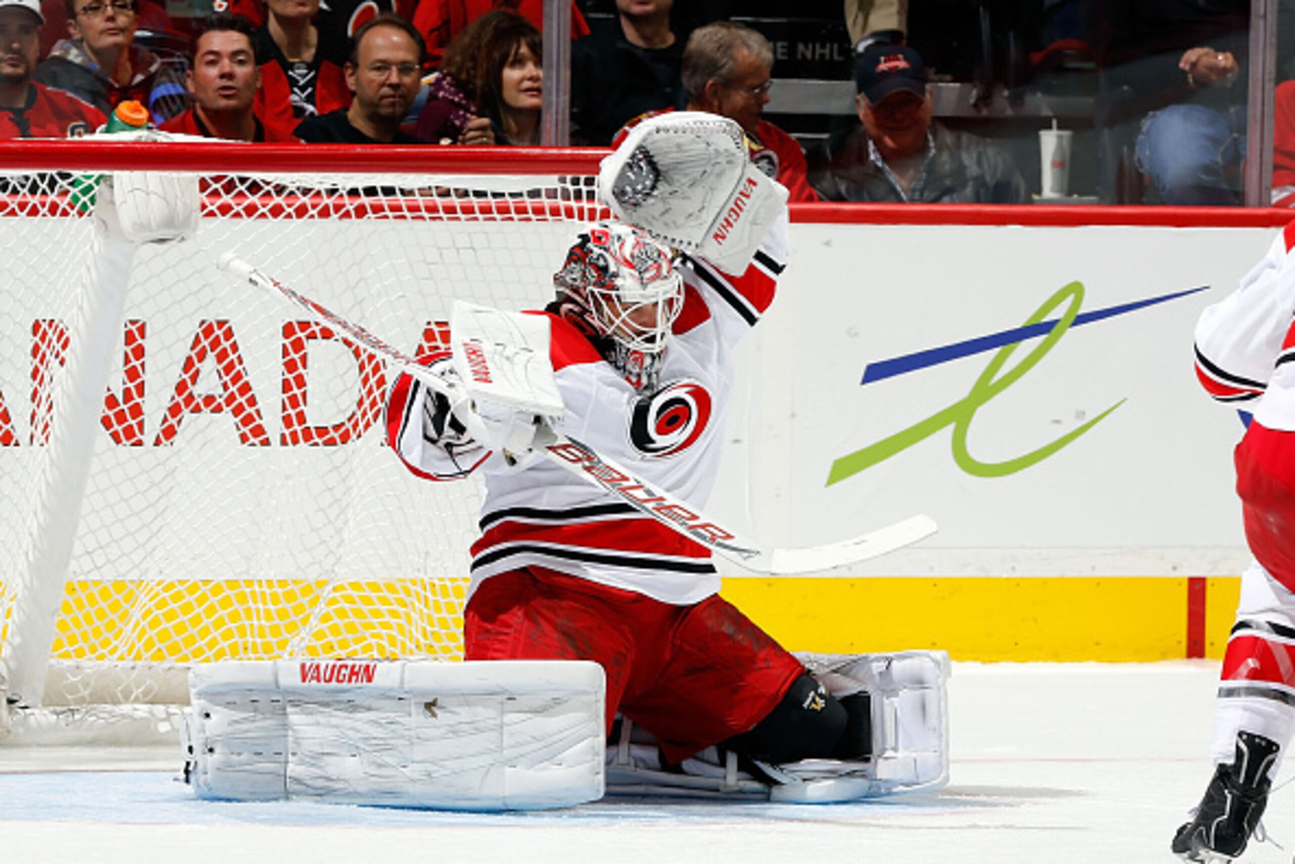 CALGARY, AB - OCTOBER 23: Cam Ward #30 of the Carolina Hurricanes reacts to a high shot against the Calgary Flames at Scotiabank Saddledome on October 23, 2014 in Calgary, Alberta, Canada. (Photo by Gerry Thomas/NHLI via Getty Images) CALGARY, AB - OCTOBER 23: Cam Ward #30 of the Carolina Hurricanes reacts to a high shot against the Calgary Flames at Scotiabank Saddledome on October 23, 2014 in Calgary, Alberta, Canada. (Photo by Gerry Thomas/NHLI via Getty Images)