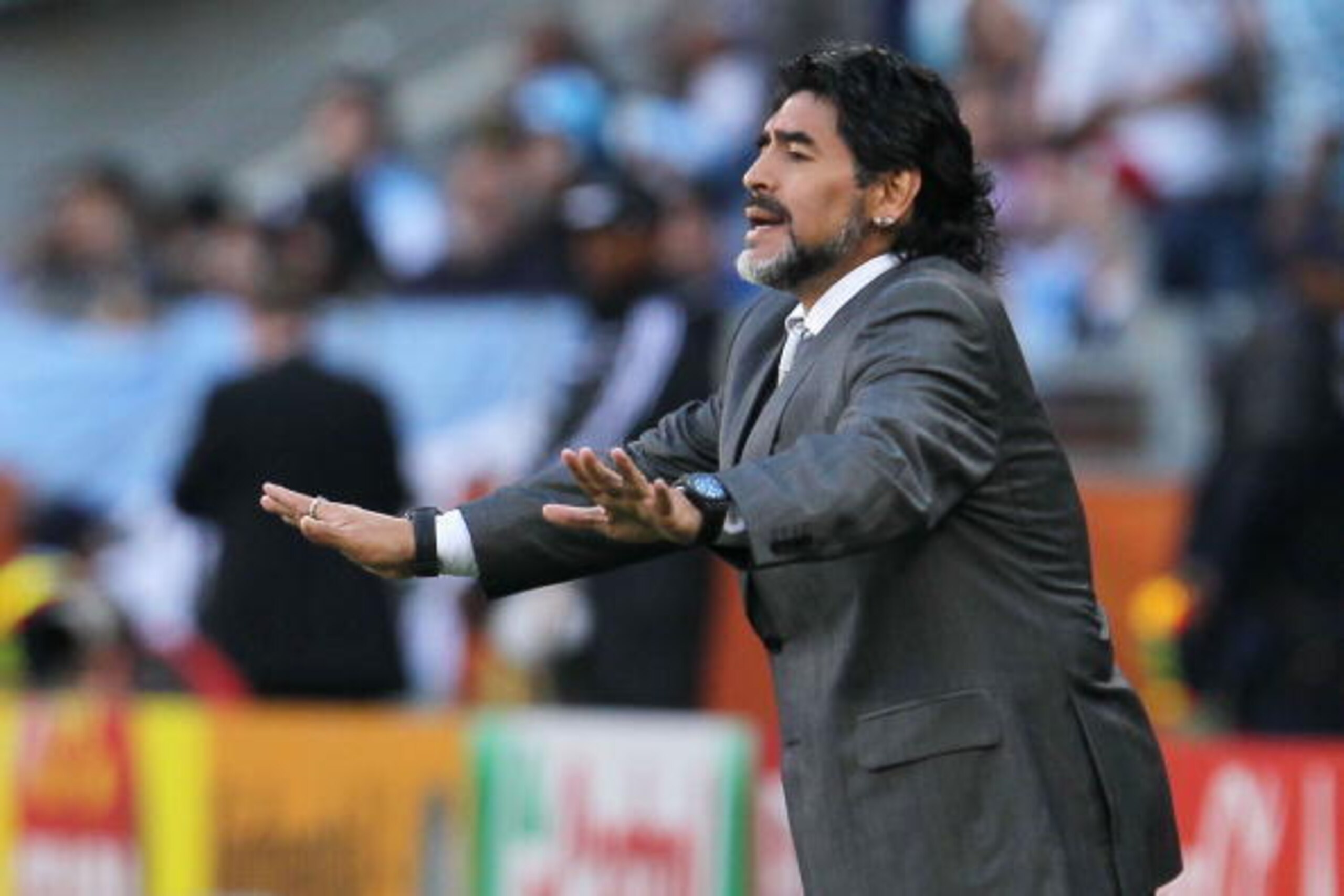 CAPE TOWN, SOUTH AFRICA - JULY 03: Diego Maradona head coach of Argentina gestures from the touchline during the 2010 FIFA World Cup South Africa Quarter Final match between Argentina and Germany at Green Point Stadium on July 3, 2010 in Cape Town, South 