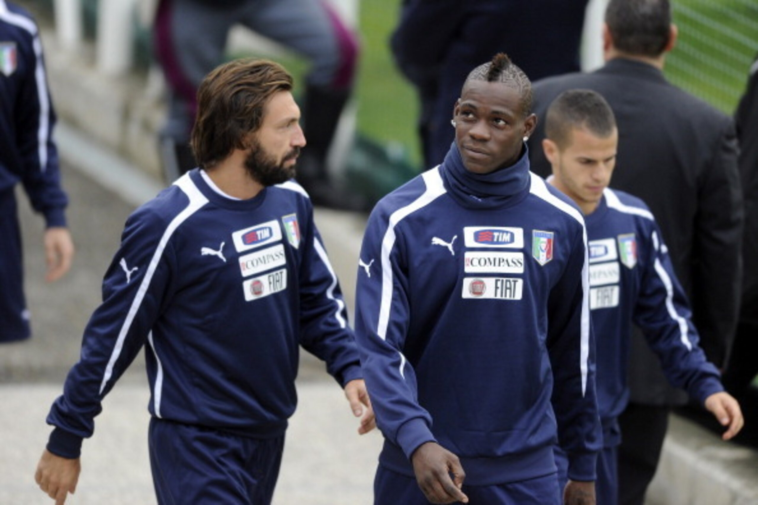 COLLECCHIO, ITALY - NOVEMBER 12:  Andrea Pirlo and Mario Balotelli (R) during Italy training session on November 12, 2012 in Collecchio, Italy.  (Photo by Claudio Villa/Getty Images)