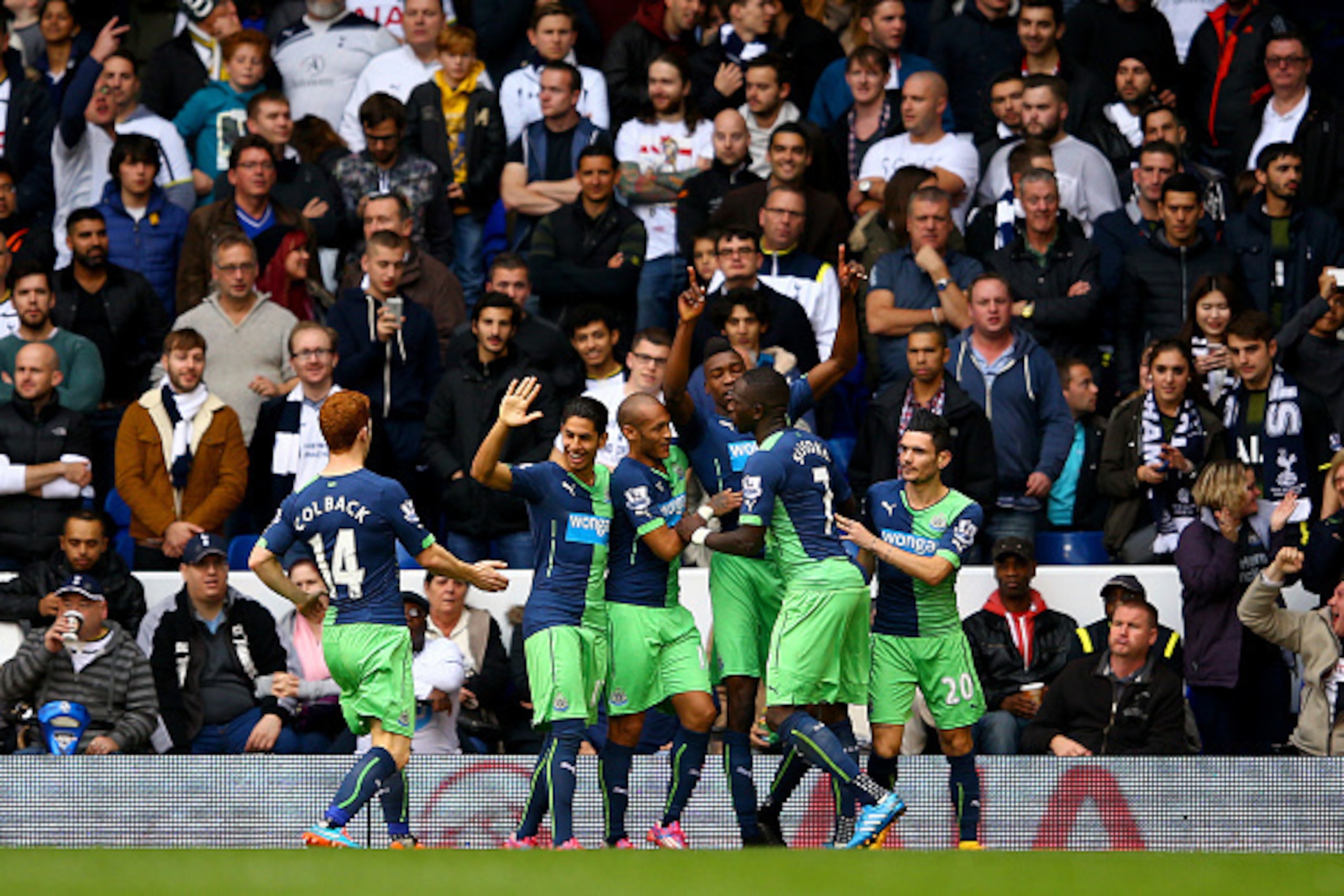 LONDON, ENGLAND - OCTOBER 26:  Sammy Ameobi of Newcastle United celebrates with team-mates after scoring his team's first goal during the Barclays Premier League match between Tottenham Hotspur and Newcastle United at White Hart Lane on October 26, 2014 i