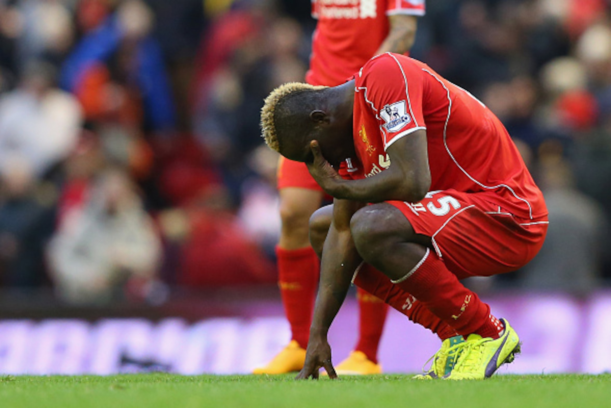 LIVERPOOL, ENGLAND - OCTOBER 25:  Mario Balotelli of Liverpool looks dejected after the Barclays Premier League match between Liverpool and Hull City at Anfield on October 25, 2014 in Liverpool, England.  (Photo by Alex Livesey/Getty Images)