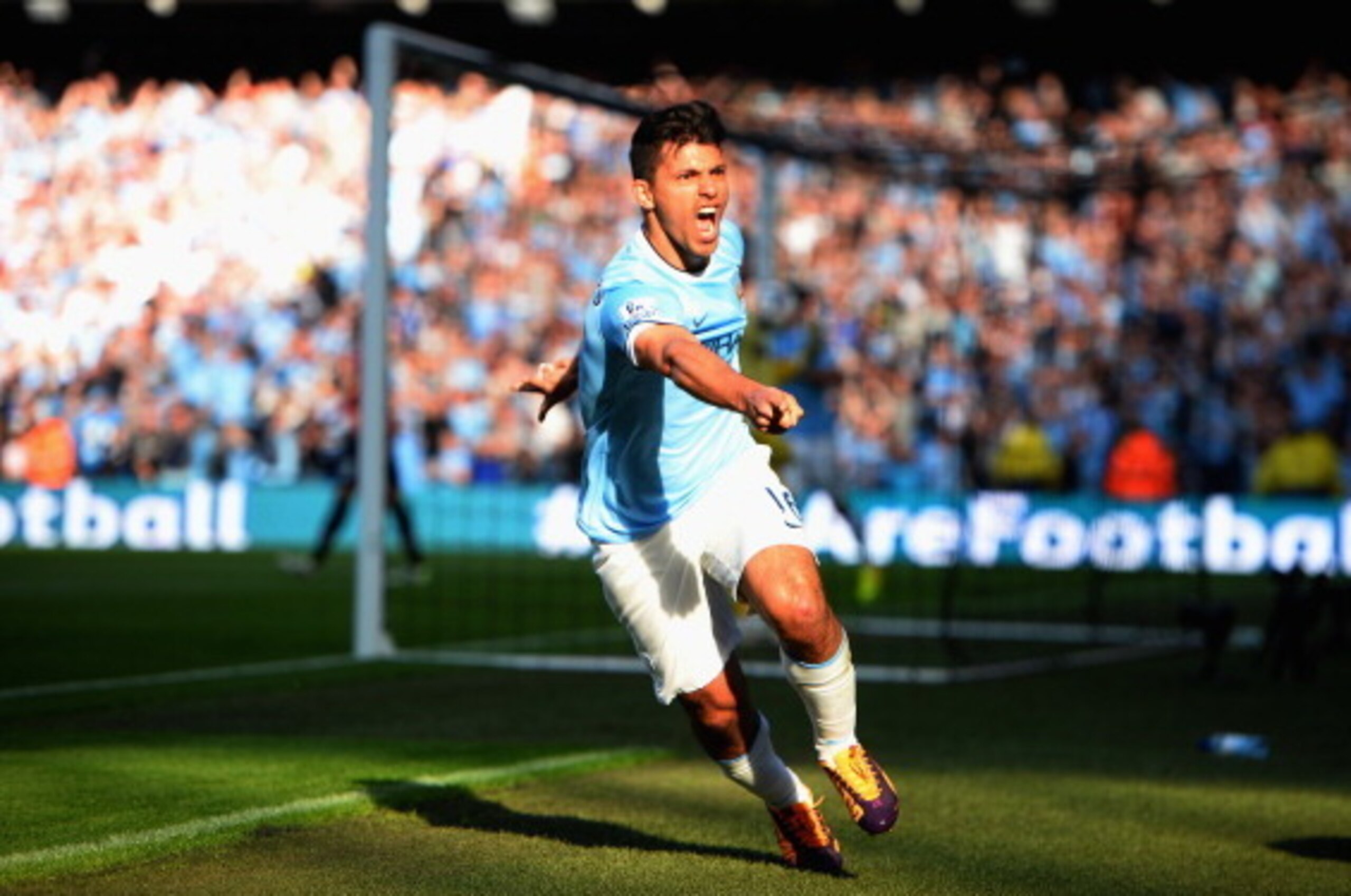MANCHESTER, ENGLAND - SEPTEMBER 22:  Sergio Aguero of Manchester City (16) celebrates as he scores their first goal during the Barclays Premier League match between Manchester City and Manchester United at the Etihad Stadium on September 22, 2013 in Manch