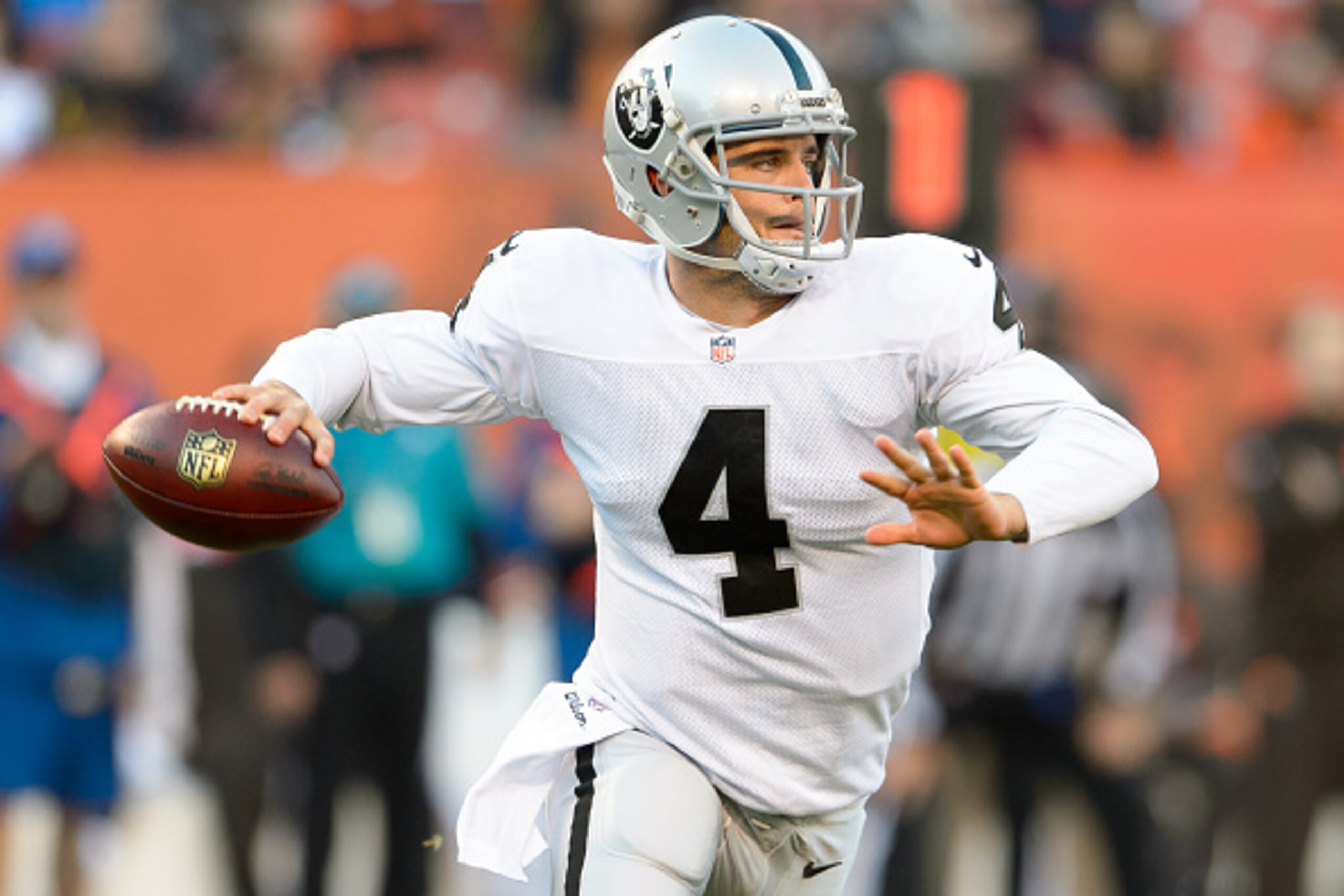 CLEVELAND, OH - OCTOBER 26: Quarterback Derek Carr #4 of the Oakland Raiders passes during the first half against the Cleveland Browns at FirstEnergy Stadium in Cleveland, Ohio. (Photo by Jason Miller/Getty Images)