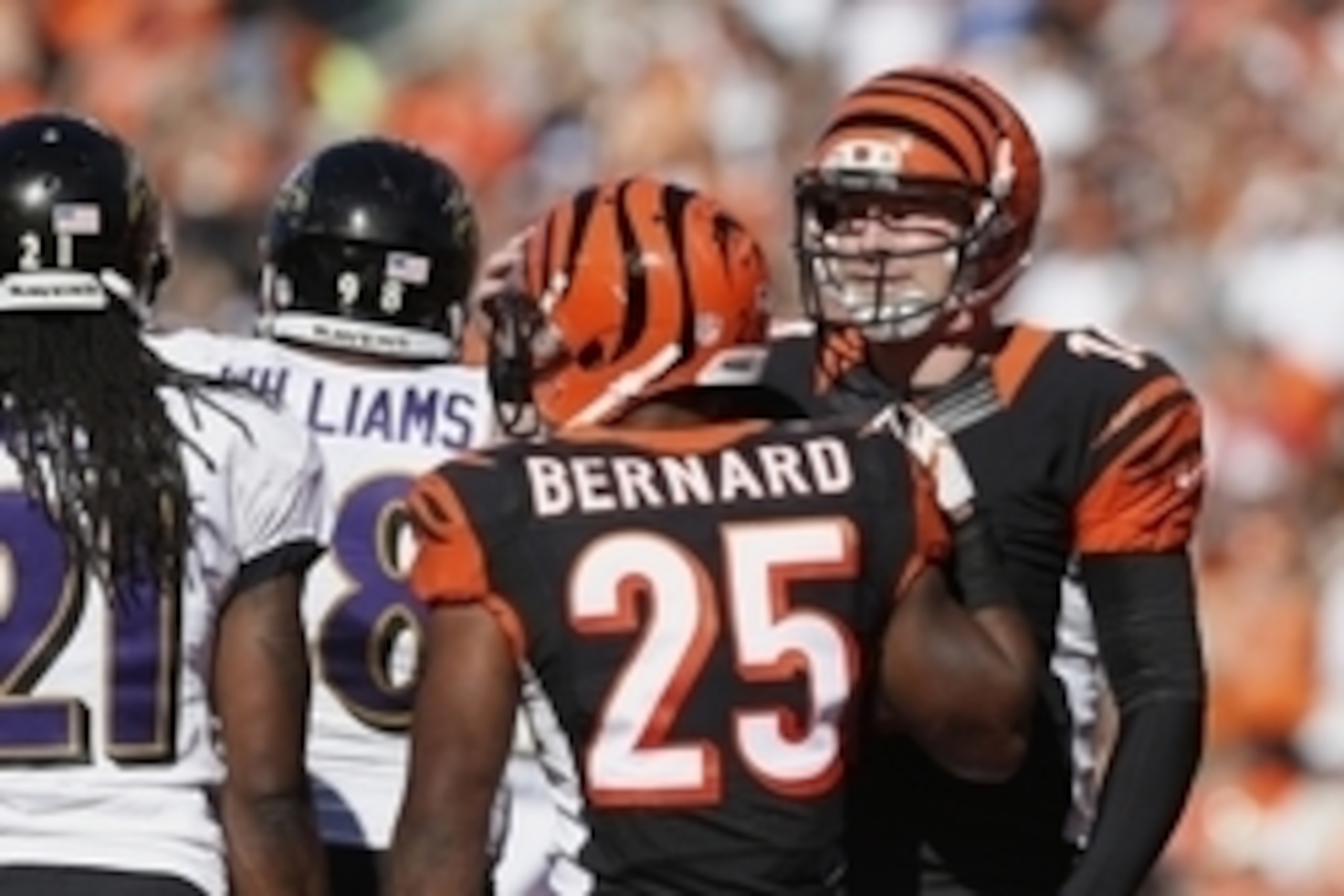Oct 26, 2014; Cincinnati, OH, USA; Cincinnati Bengals running back Giovani Bernard (25) celebrates his touchdown with quarterback Andy Dalton (14) during the second half against the Baltimore Ravens at Paul Brown Stadium. The Bengals won 27-24. Mandatory
