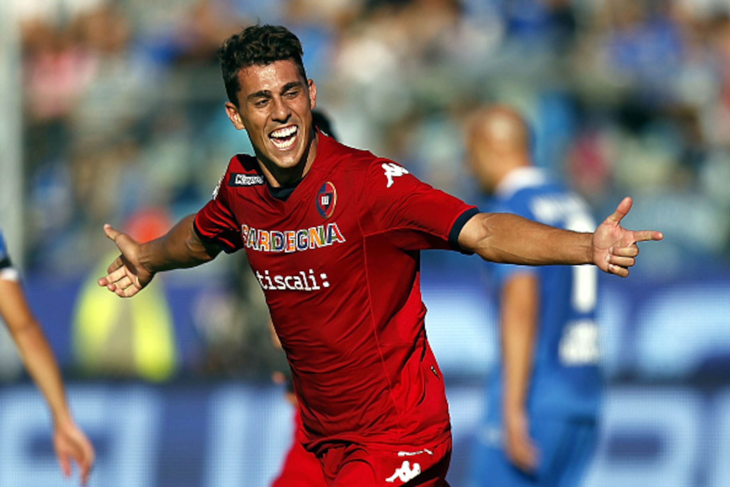EMPOLI, ITALY - OCTOBER 25: Danilo Avelar of Cagliari Calcio celebrates after scoring a goal during the Serie A match between Empoli FC and Cagliari Calcio  at Stadio Carlo Castellani on October 25, 2014 in Empoli, Italy.  (Photo by Gabriele Maltinti/Gett