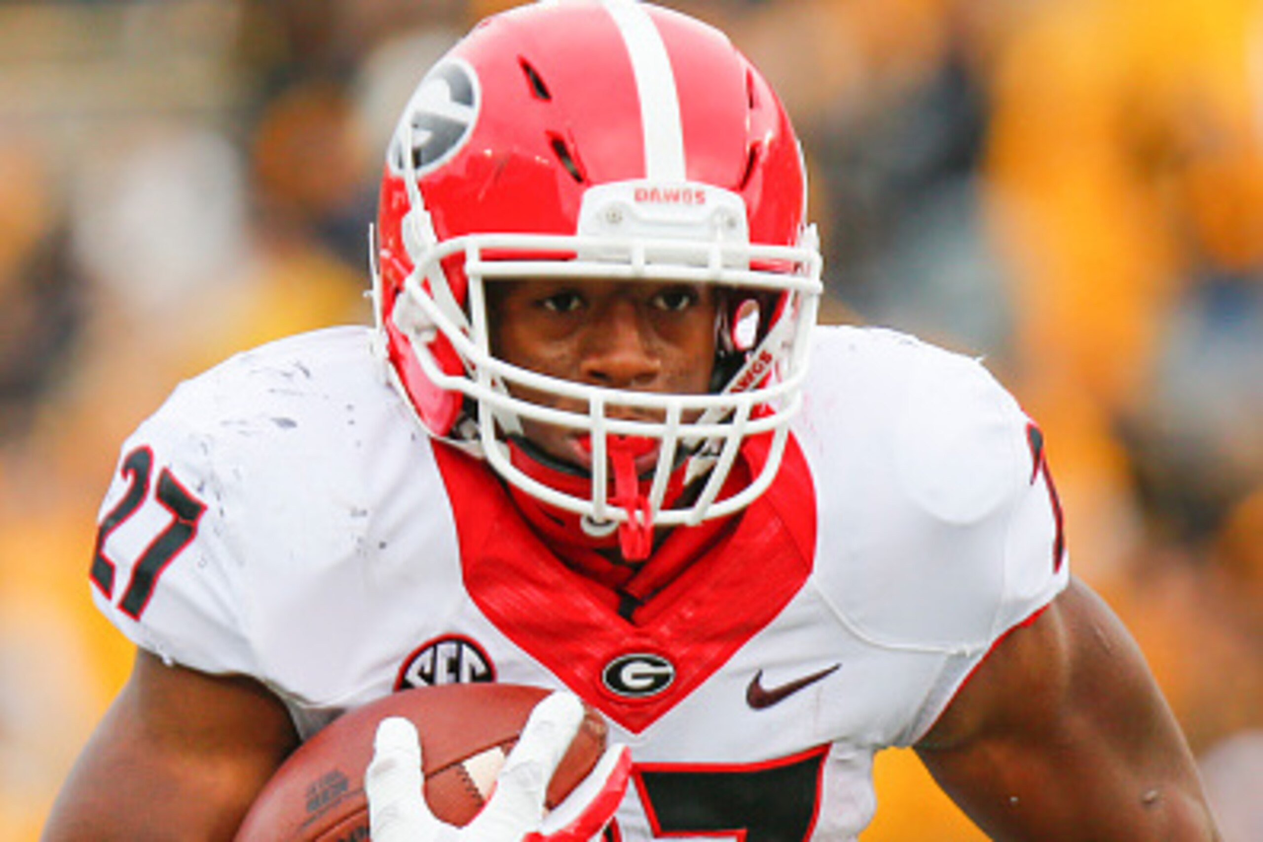 COLUMBIA, MO - OCTOBER 11: Nick Chubb #27 of the Georgia Bulldogs moves past the Missouri Tigers defense in the second half on October 11, 2014 at Faurot Field/Memorial Stadium in Columbia, Missouri. (Photo by Kyle Rivas/Getty Images)