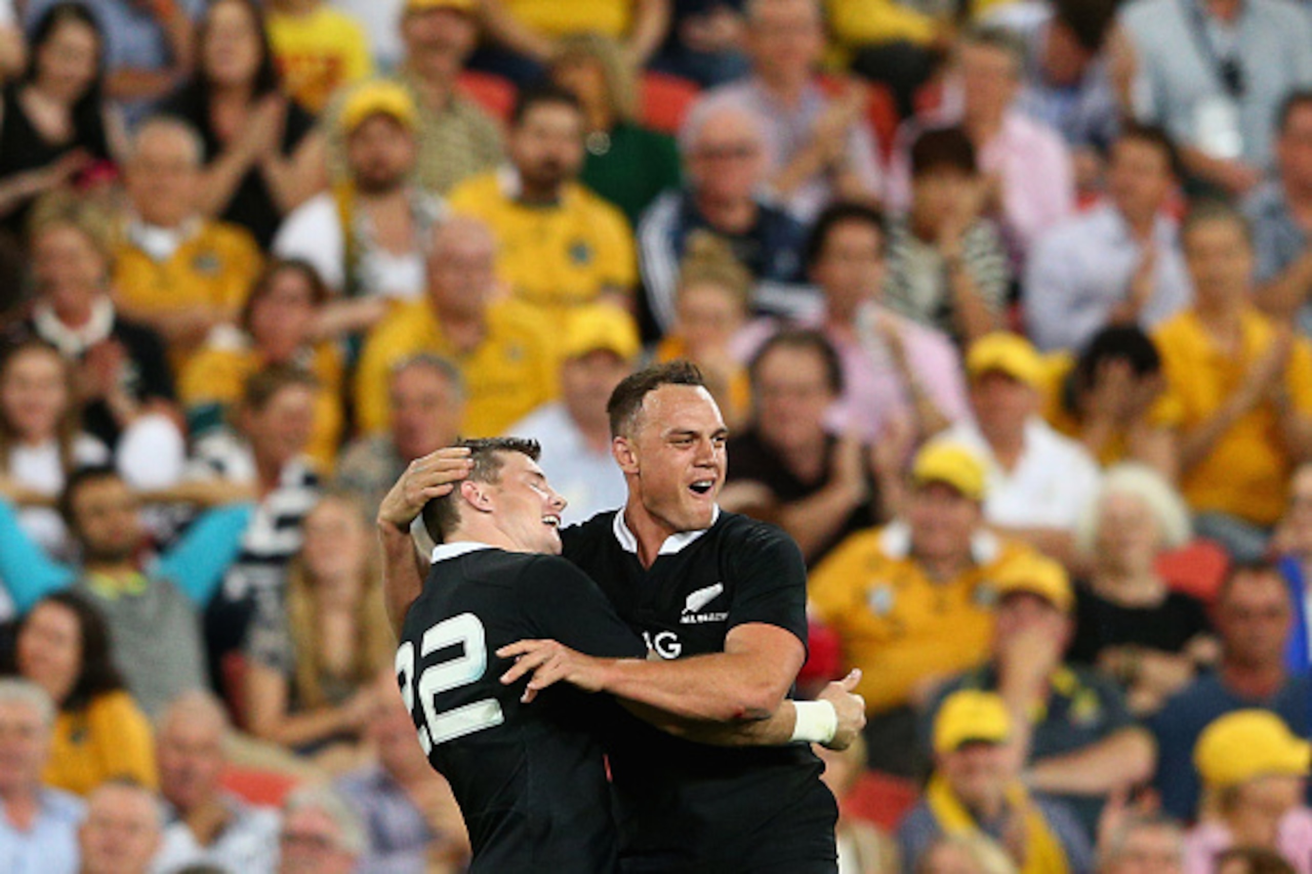 BRISBANE, AUSTRALIA - OCTOBER 18: Israel Dagg of the All Blacks congratulates team mate Colin Slade of the All Blacks after kicking the winning conversion during The Rugby Championship match between the Australian Wallabies and the New Zealand All Blacks 