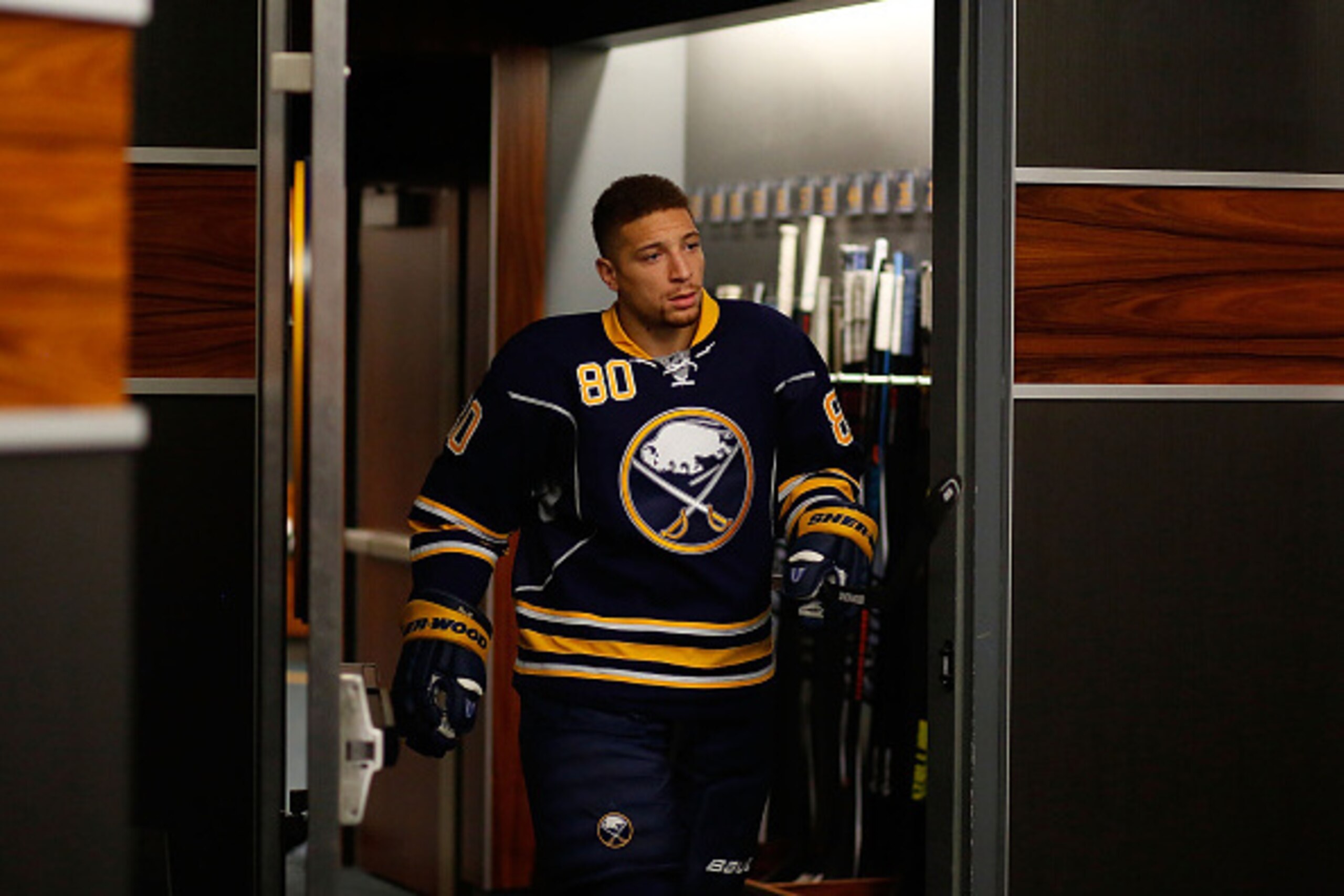 BUFFALO, NY - OCTOBER 18: Chris Stewart #80 of the Buffalo Sabres heads to the ice to play the Boston Bruins on October 18, 2014 at the First Niagara Center in Buffalo, New York.  (Photo by Bill Wippert/NHLI via Getty Images)