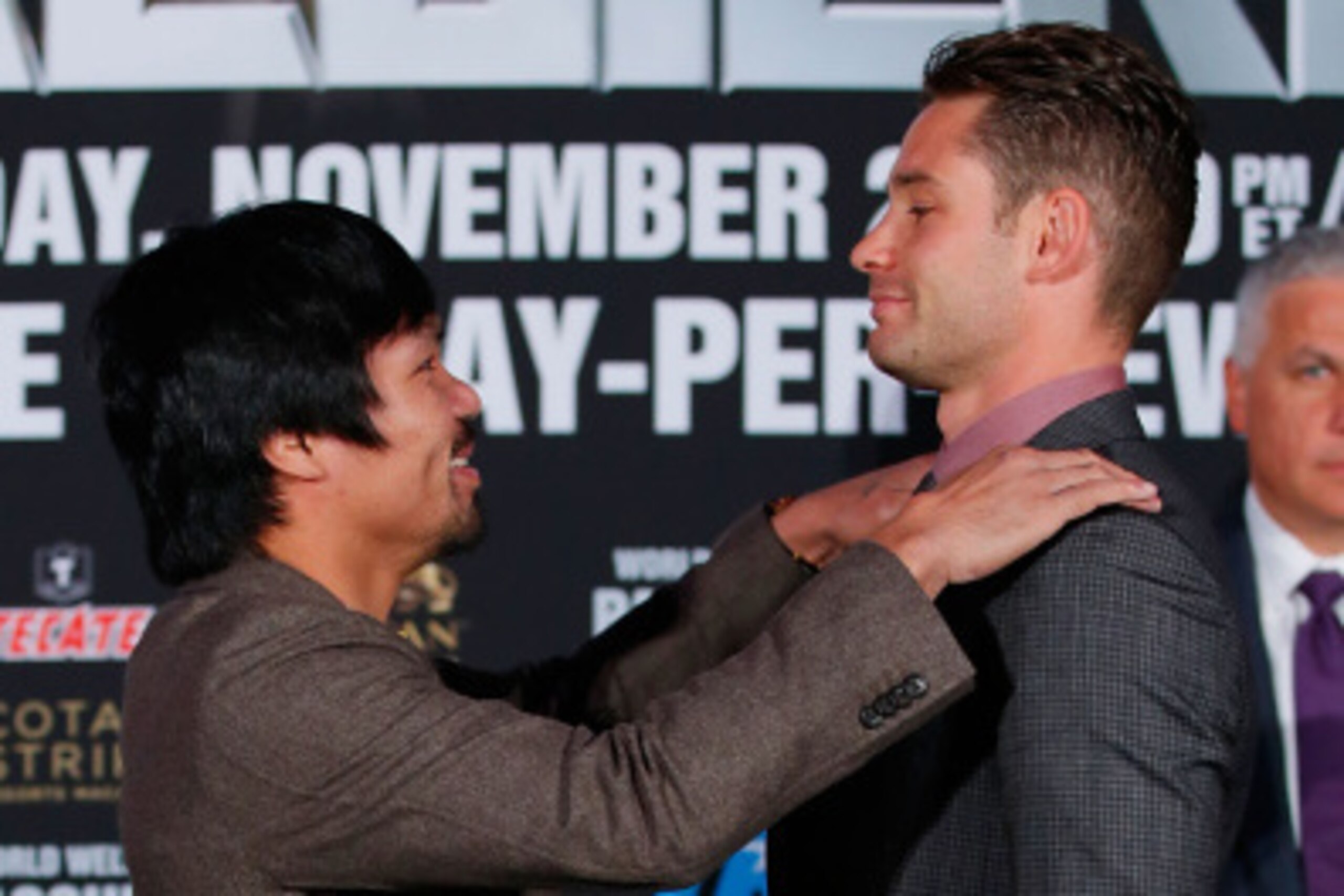 NEW YORK, NY - SEPTEMBER 04:  Manny Pacquiao and Chris Algieri attend the Manny Pacquiao v Chris Algieri Media Tour at The Liberty Theatre on September 4, 2014 in New York City.  (Photo by Joe Scarnici/Getty Images)