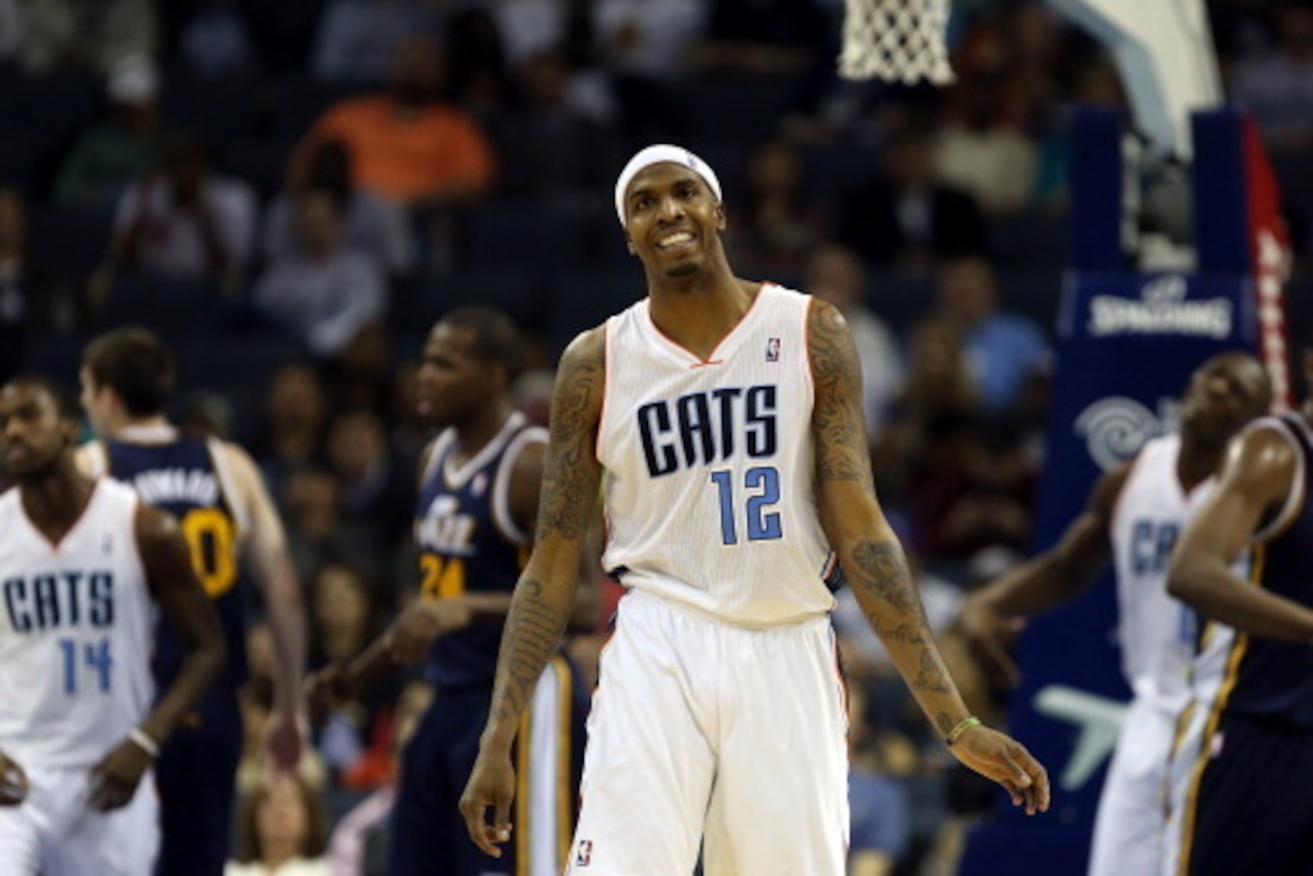 CHARLOTTE, NC - JANUARY 09:  Tyrus Thomas #12 of the Charlotte Bobcats reacts after a play during their game against the Utah Jazz at Time Warner Cable Arena on January 9, 2013 in Charlotte, North Carolina.  NOTE TO USER: User expressly acknowledges and a