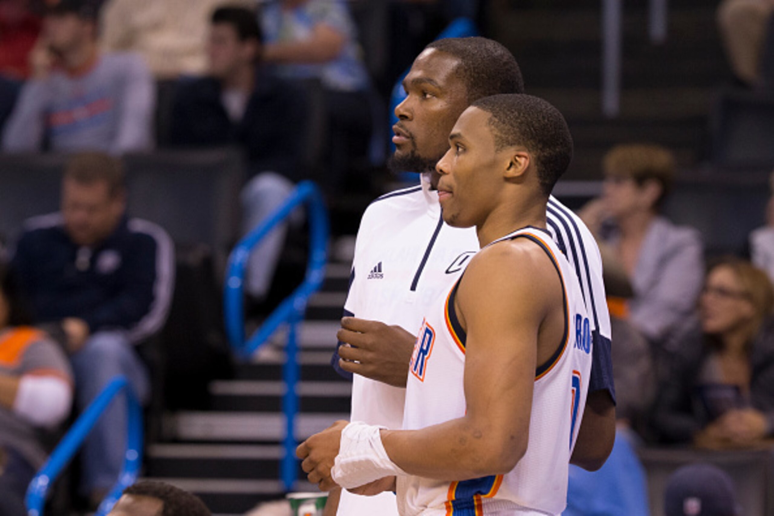 OKLAHOMA CITY, OK - OCTOBER 14:  (L-R) Kevin Durant #35  and Russell Westbrook #0 of the Oklahoma City Thunder during the game against the Memphis Grizzlies at the Chesapeak Energy Arena on October 14, 2014 in Oklahoma City, Oklahoma. NOTE TO USER:  User 
