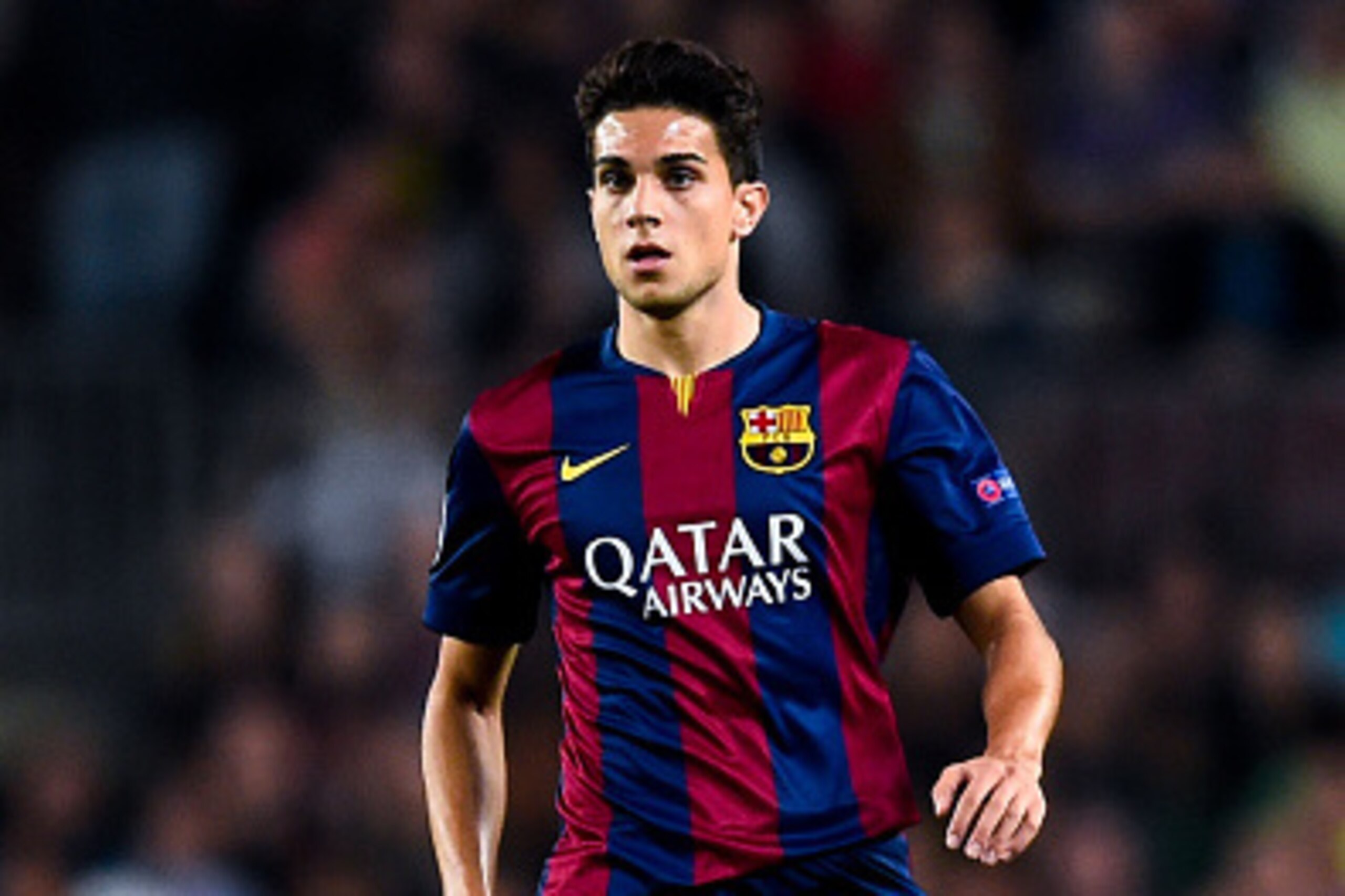 BARCELONA, SPAIN - OCTOBER 21:  Marc Bartra of FC Barcelona runs with the ball during a UEFA Champions League Group F match between FC Barcelona and AFC Ajax at the Camp Nou Stadium on October 21, 2014 in Barcelona, Spain.  (Photo by David Ramos/Getty Ima