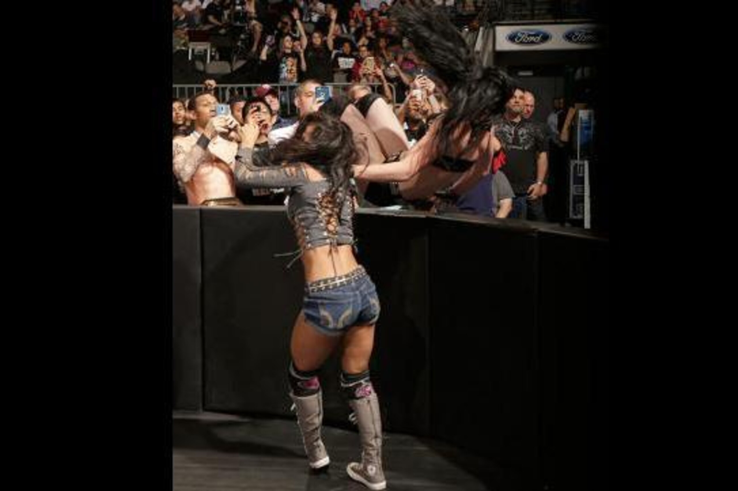AJ Lee takes down Paige. AJ Lee takes down Paige.