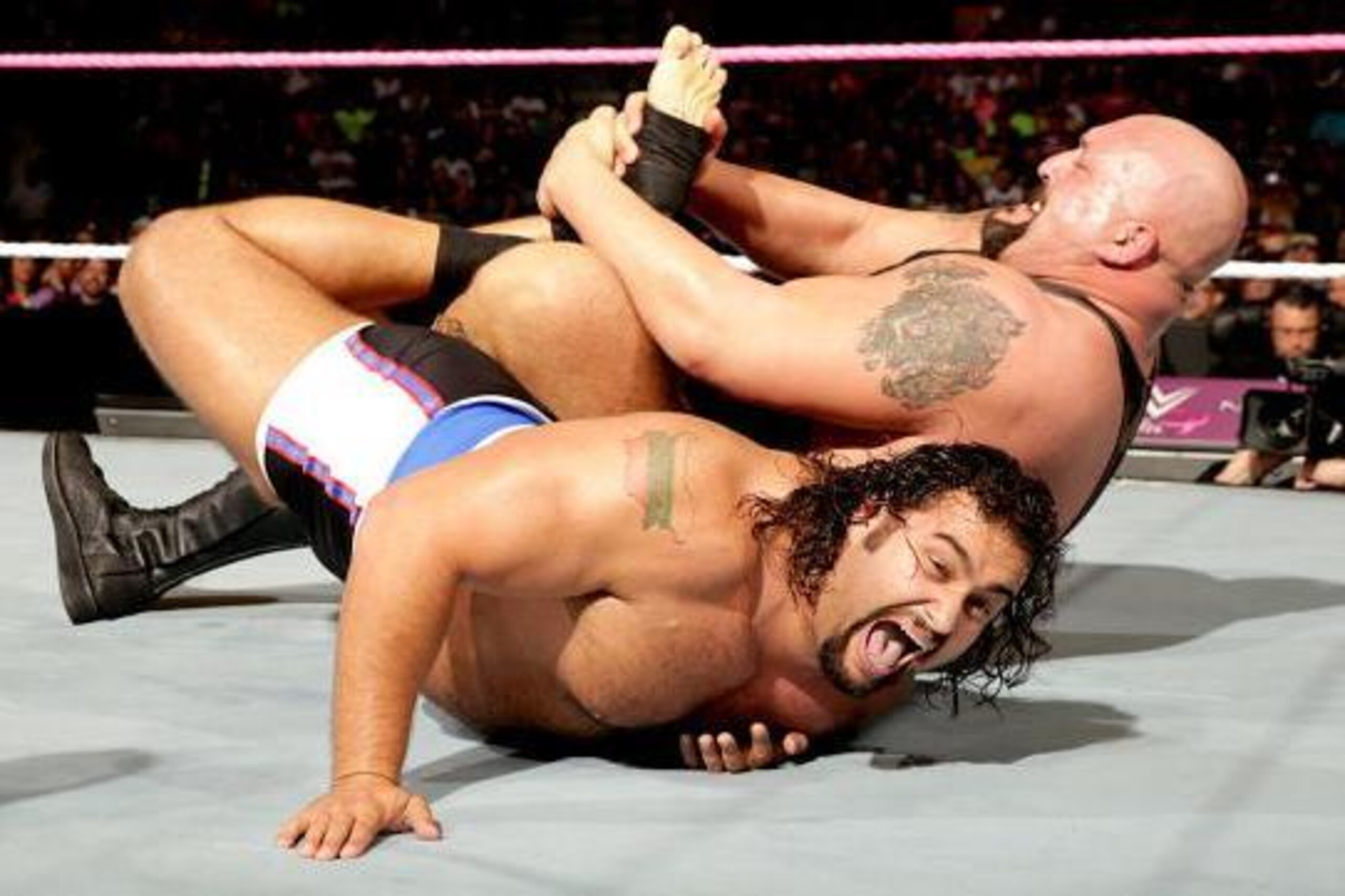 Big Show puts the hurt on Rusev. Big Show puts the hurt on Rusev.