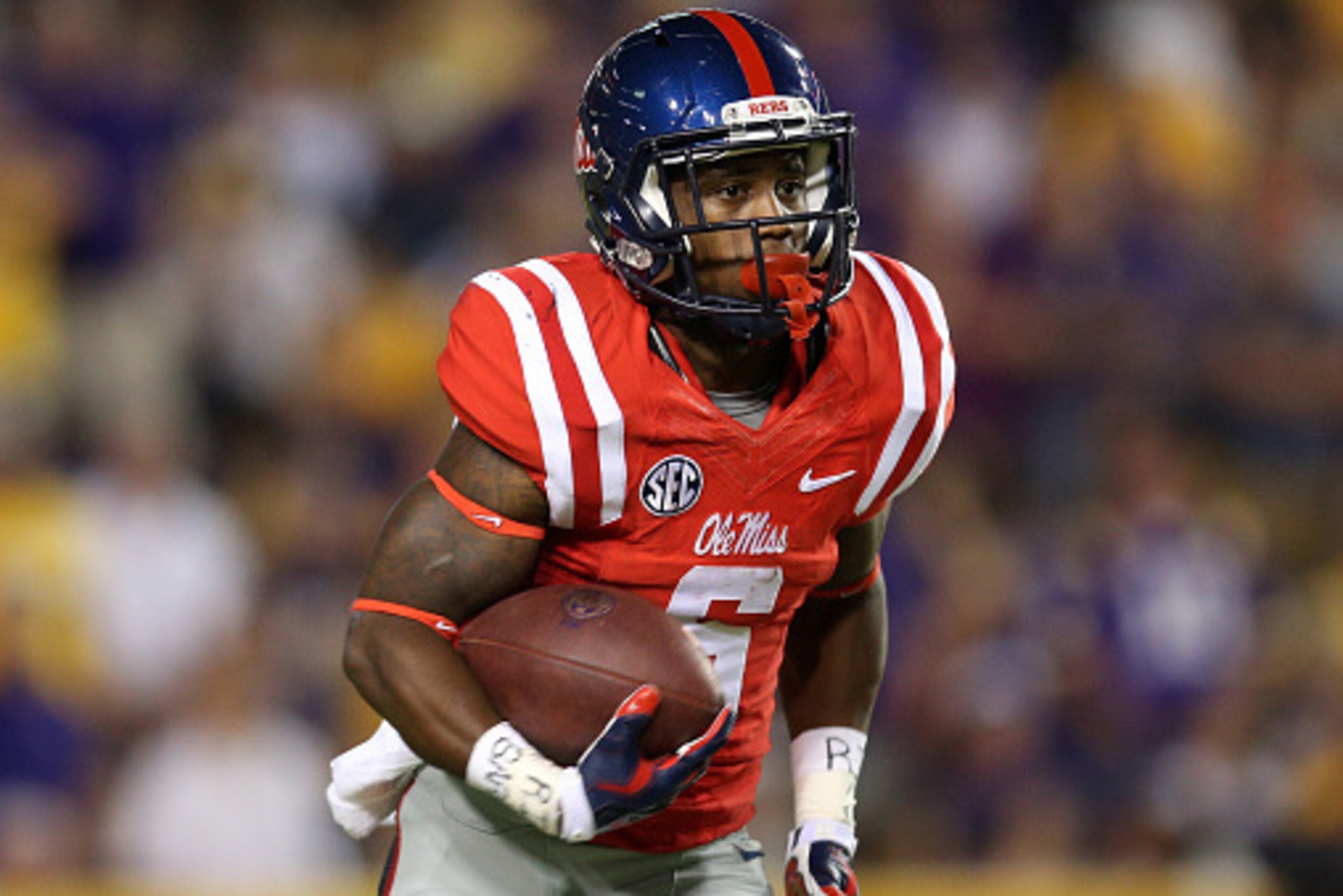 BATON ROUGE, LA - OCTOBER 25:  Jaylen Walton #6 of the Mississippi Rebels runs the ball against the LSU Tigers at Tiger Stadium on October 25, 2014 in Baton Rouge, Louisiana.  (Photo by Chris Graythen/Getty Images)