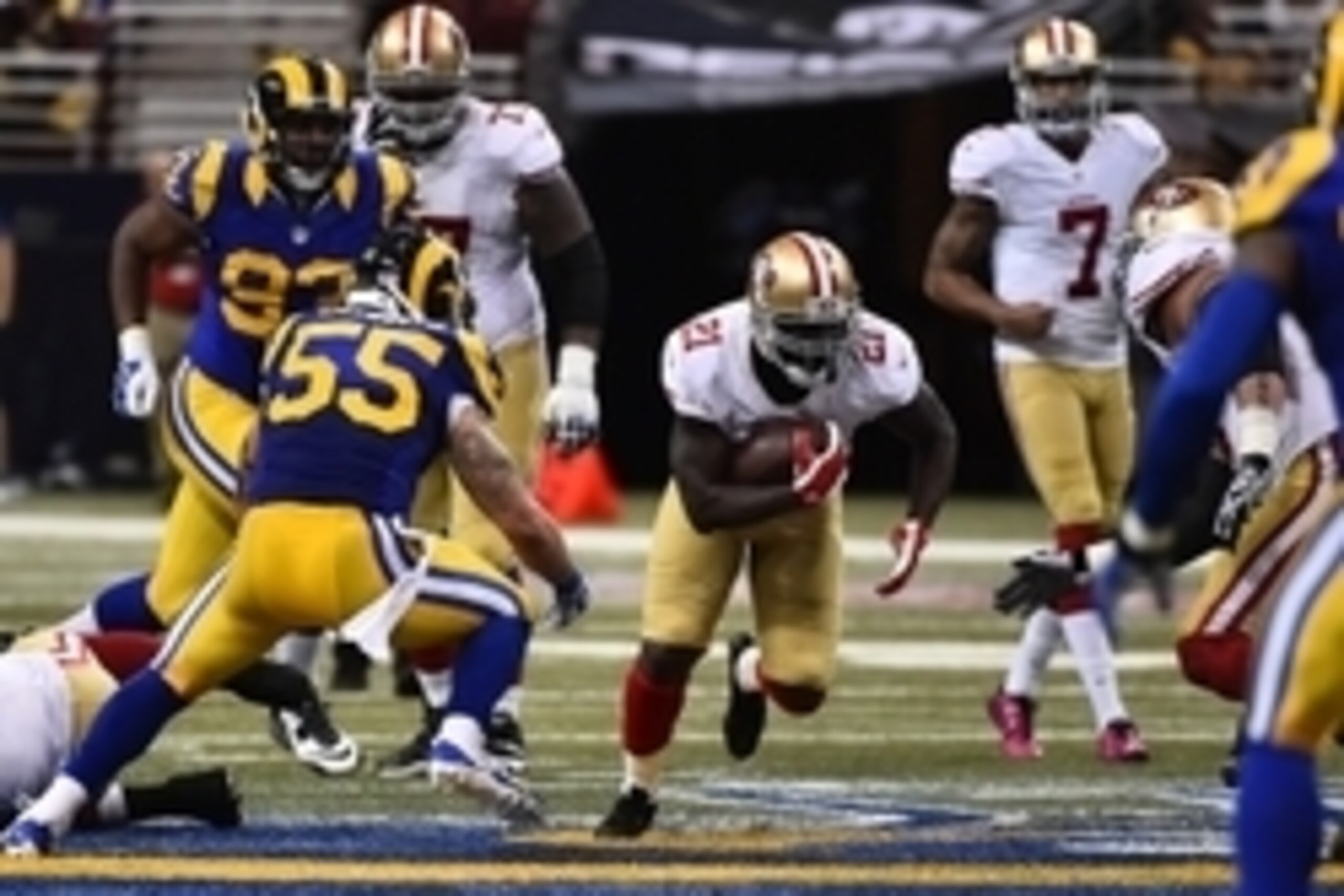 Oct 13, 2014; St. Louis, MO, USA; San Francisco 49ers runingback Frank Gore (21) runs the ball against the St. Louis Rams during the second half at the Edward Jones Dome. The San Francisco 49ers defeat the St. Louis Rams 31-17. Mandatory Credit: Jasen Vin Oct 13, 2014; St. Louis, MO, USA; San Francisco 49ers runingback Frank Gore (21) runs the ball against the St. Louis Rams during the second half at the Edward Jones Dome. The San Francisco 49ers defeat the St. Louis Rams 31-17. Mandatory Credit: Jasen Vin