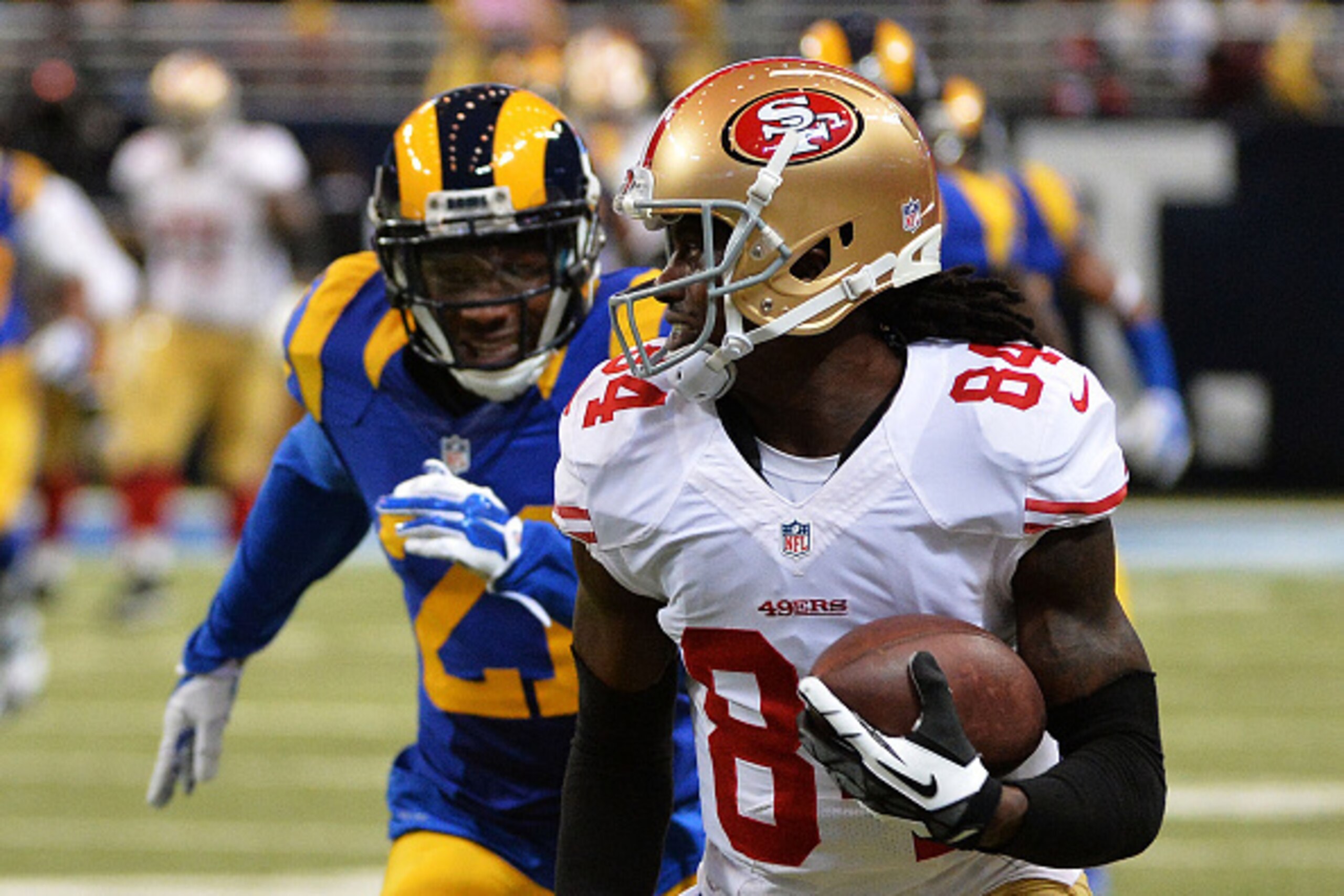 ST LOUIS, MO - OCTOBER 13: Brandon Lloyd #84 of the San Francisco 49ers runs with a reception for an 80 yard touchdown in the second quarter against the St. Louis Rams in the second quarter at Edward Jones Dome on October 13, 2014 in St Louis, Missouri. ST LOUIS, MO - OCTOBER 13: Brandon Lloyd #84 of the San Francisco 49ers runs with a reception for an 80 yard touchdown in the second quarter against the St. Louis Rams in the second quarter at Edward Jones Dome on October 13, 2014 in St Louis, Missouri.
