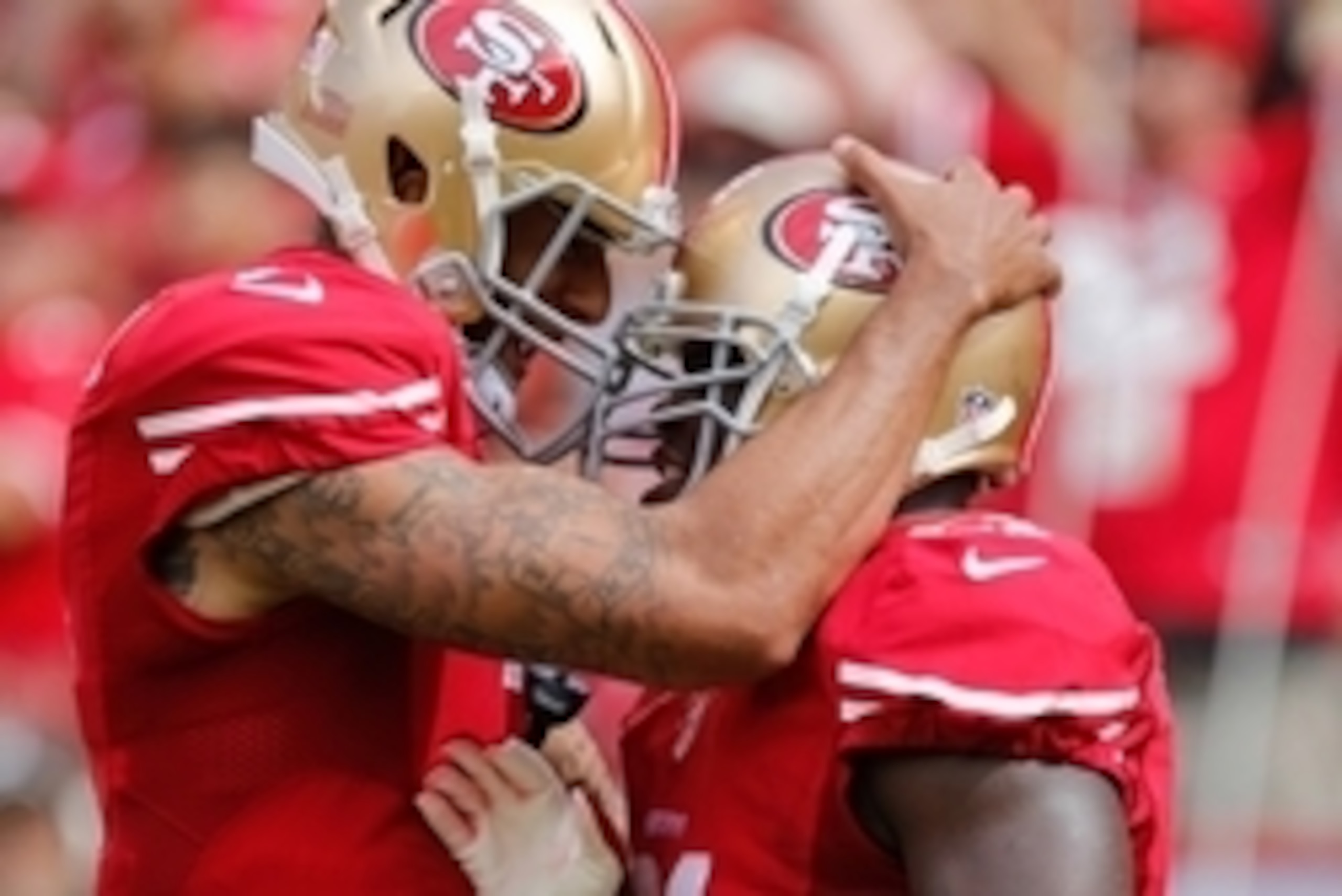 Sep 28, 2014; Santa Clara, CA, USA; San Francisco 49ers quarterback Colin Kaepernick (7) celebrates with running back Frank Gore (21) after a touchdown against the Philadelphia Eagles during the second quarter at Levi's Stadium. Mandatory Credit: Kelley L Sep 28, 2014; Santa Clara, CA, USA; San Francisco 49ers quarterback Colin Kaepernick (7) celebrates with running back Frank Gore (21) after a touchdown against the Philadelphia Eagles during the second quarter at Levi's Stadium. Mandatory Credit: Kelley L