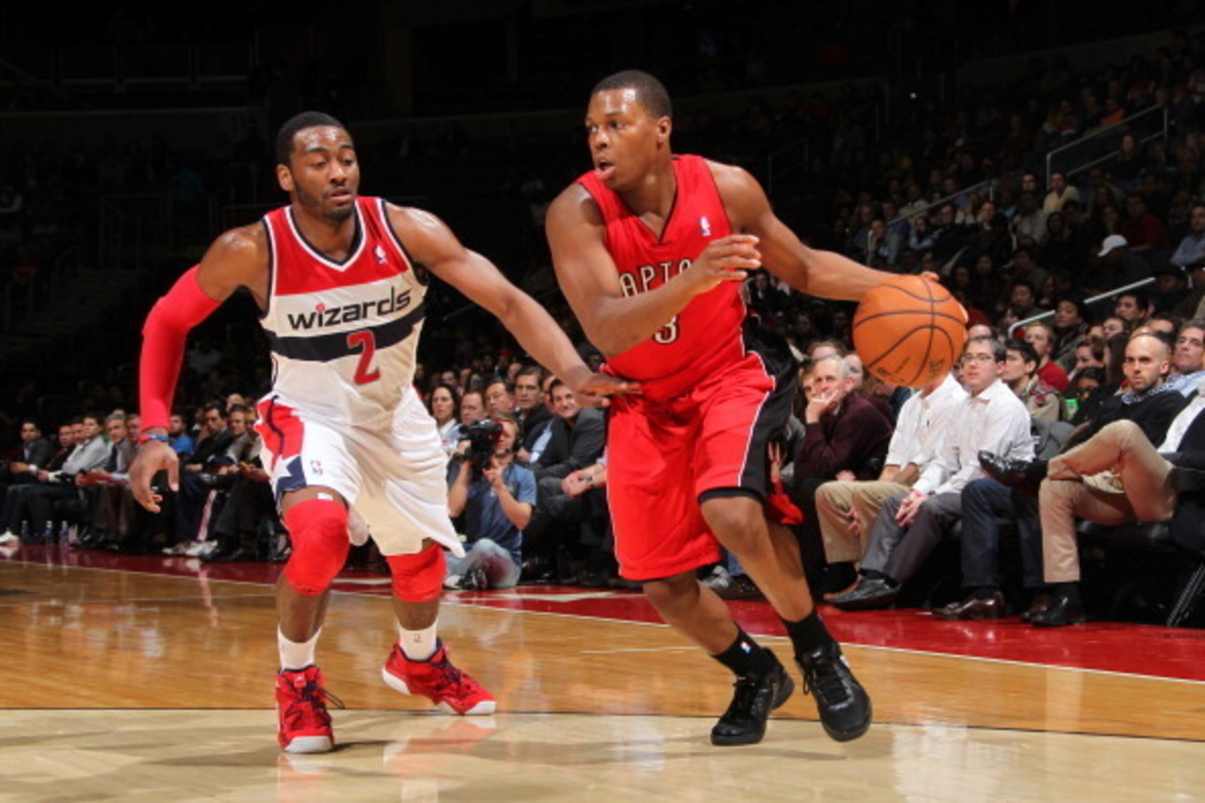 WASHINGTON, DC - FEBRUARY 19: Kyle Lowry #3 of the Toronto Raptors drives against John Wall #2 of the Washington Wizards during the game at the Verizon Center on February 19, 2013 in Washington, DC. NOTE TO USER: User expressly acknowledges and agrees tha WASHINGTON, DC - FEBRUARY 19: Kyle Lowry #3 of the Toronto Raptors drives against John Wall #2 of the Washington Wizards during the game at the Verizon Center on February 19, 2013 in Washington, DC. NOTE TO USER: User expressly acknowledges and agrees tha