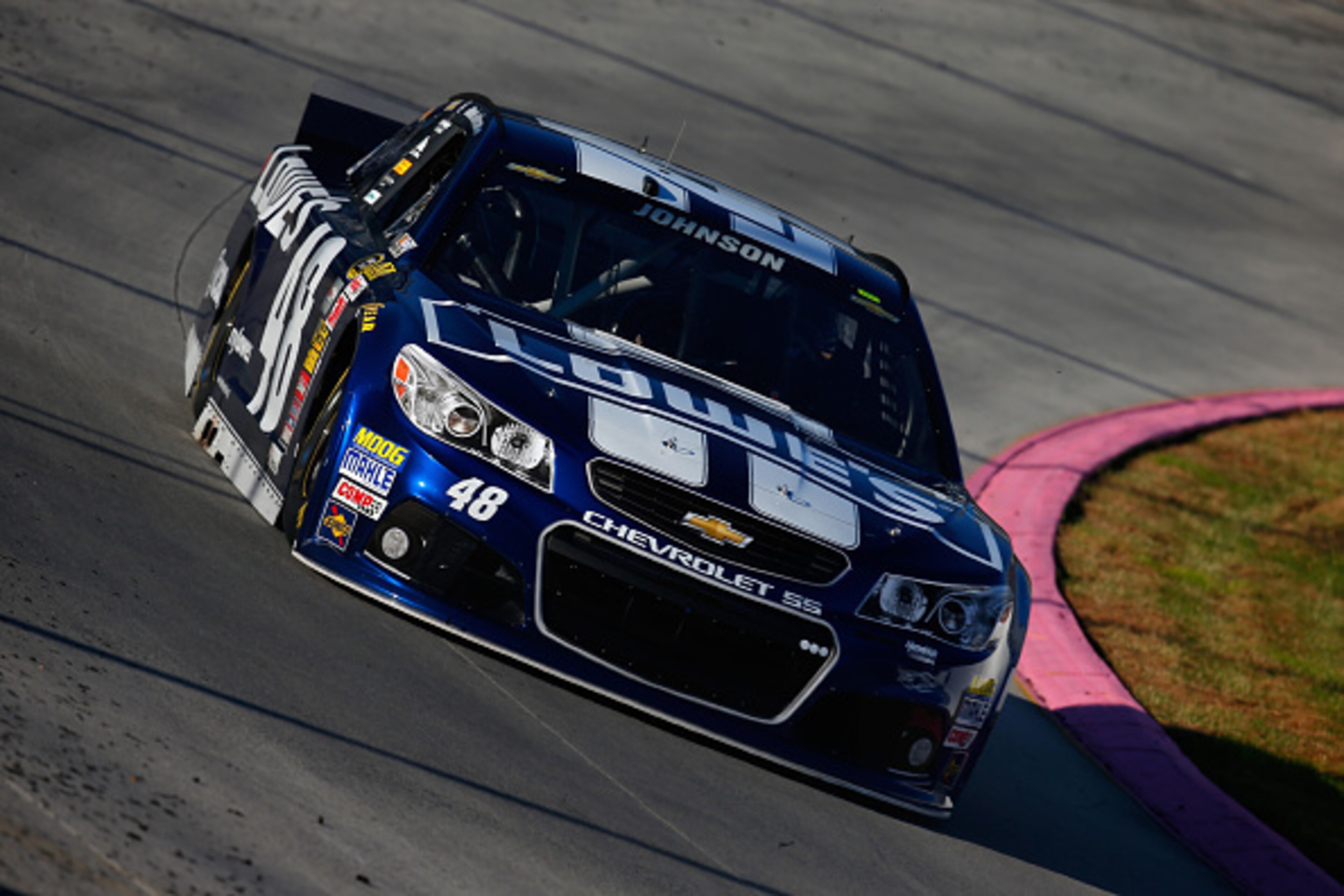 MARTINSVILLE, VA - OCTOBER 25:  Jimmie Johnson, driver of the #48 Lowe's Chevrolet, practices for the NASCAR Sprint Cup Series Goody's Headache Relief Shot 500 at Martinsville Speedway on October 25, 2014 in Martinsville, Virginia.  (Photo by Chris Trotma
