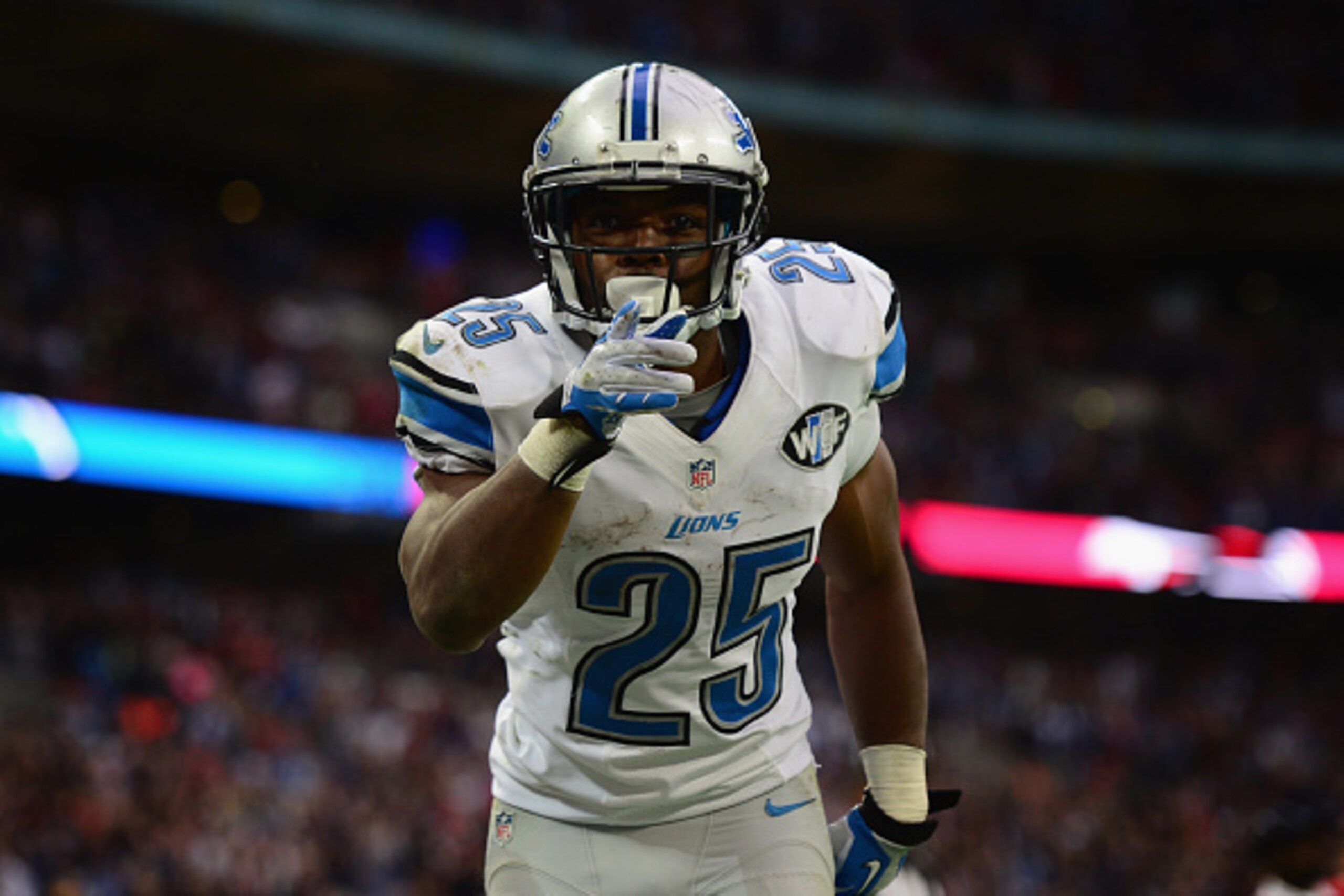 LONDON, ENGLAND - OCTOBER 26:  Theo Riddick #25 of the Detroit Lions celebrates scoring a touchdown in the fourth quarter during the NFL match between Detroit Lions and  Atlanta Falcons at Wembley Stadium on October 26, 2014 in London, England.  (Photo by