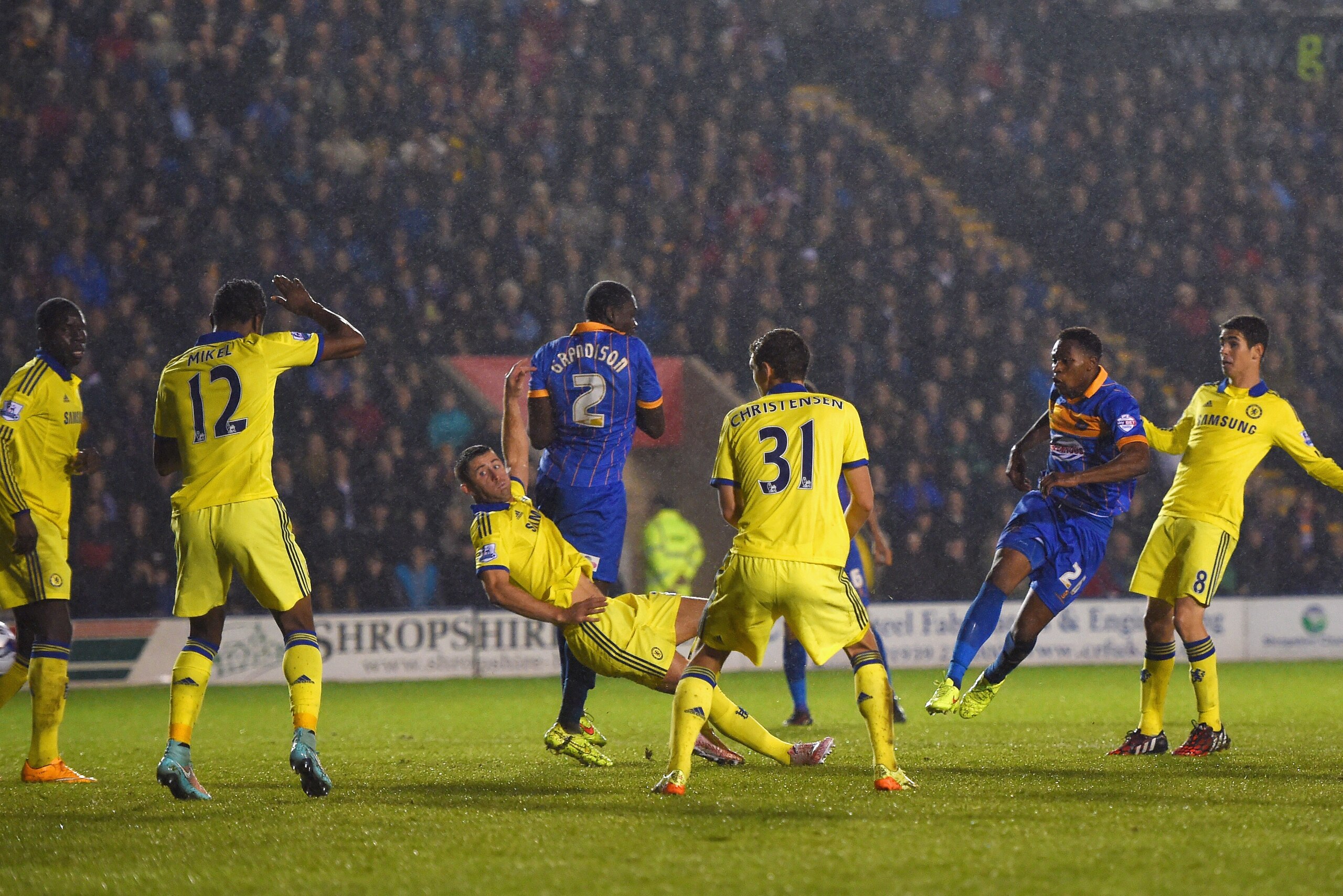 SHREWSBURY, ENGLAND - OCTOBER 28:  Jean-Louis Akpa Akpro of Shrewsbury Town comes close with a shot at goal during the Capital One Cup Fourth Round match between Shrewsbury Town and Chelsea at Greenhous Meadow on October 28, 2014 in Shrewsbury, England.