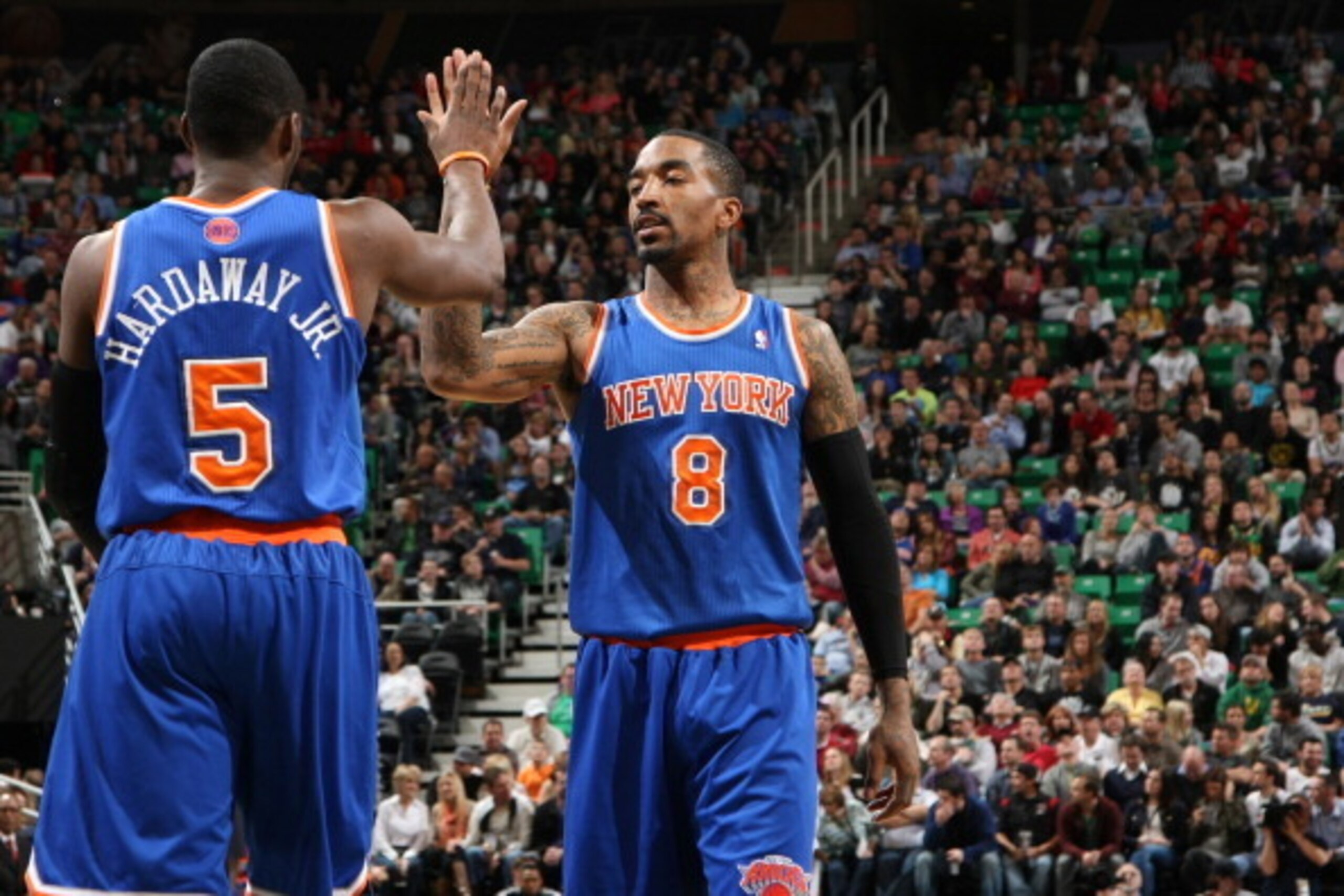 SALT LAKE CITY, UT - MARCH 31:  J.R. Smith #8 and Tim Hardaway Jr. #5 of the New York Knicks celebrate during the game against the Utah Jazz at EnergySolutions Arena on March 31, 2014 in Salt Lake City, Utah. NOTE TO USER: User expressly acknowledges and 