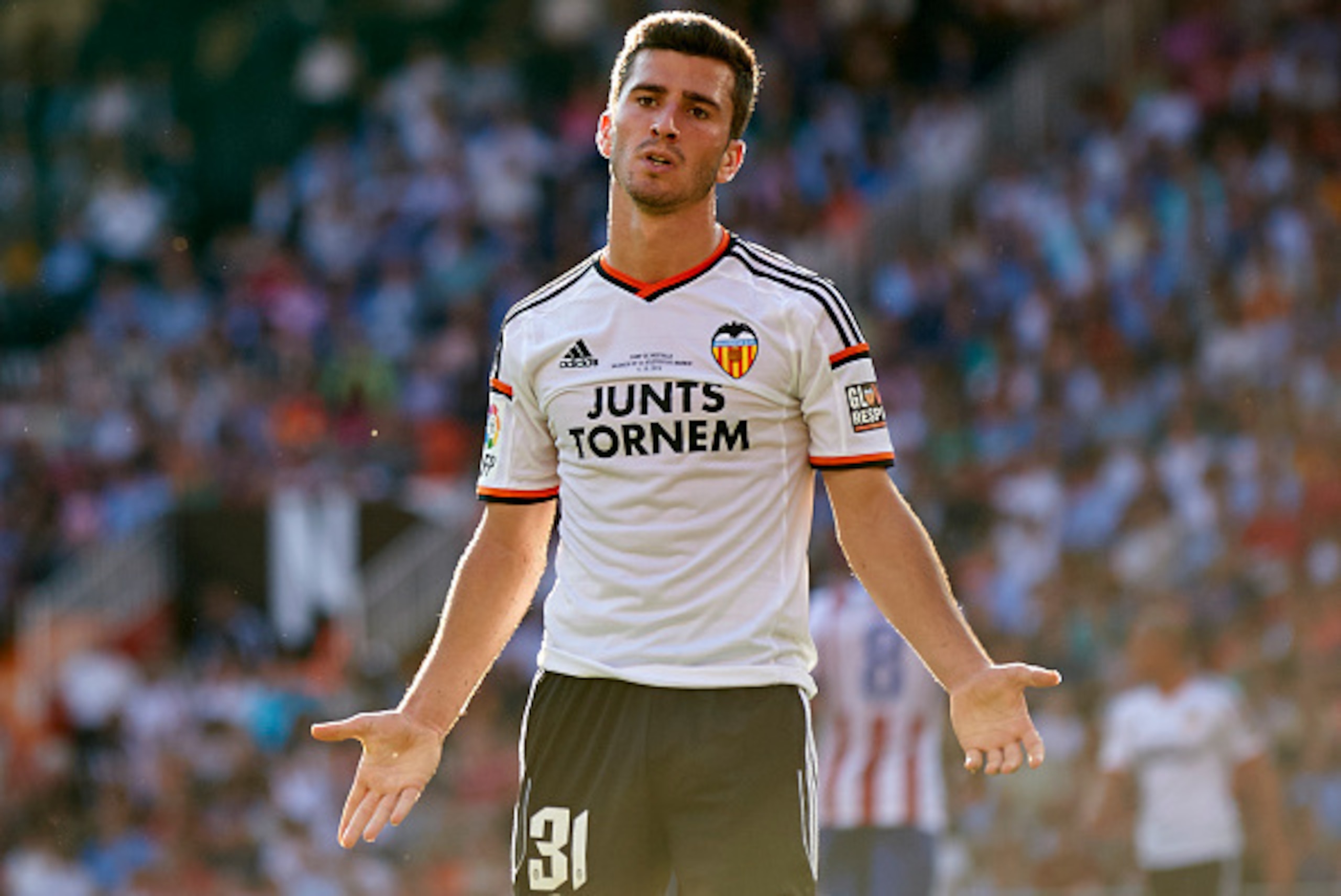VALENCIA, SPAIN - OCTOBER 04:  Jose Gaya of Valencia reacts during the La Liga match between Valencia CF and Club Atletico de Madrid at Estadi de Mestalla on October 4, 2014 in Valencia, Spain.  (Photo by Manuel Queimadelos Alonso/Getty Images)