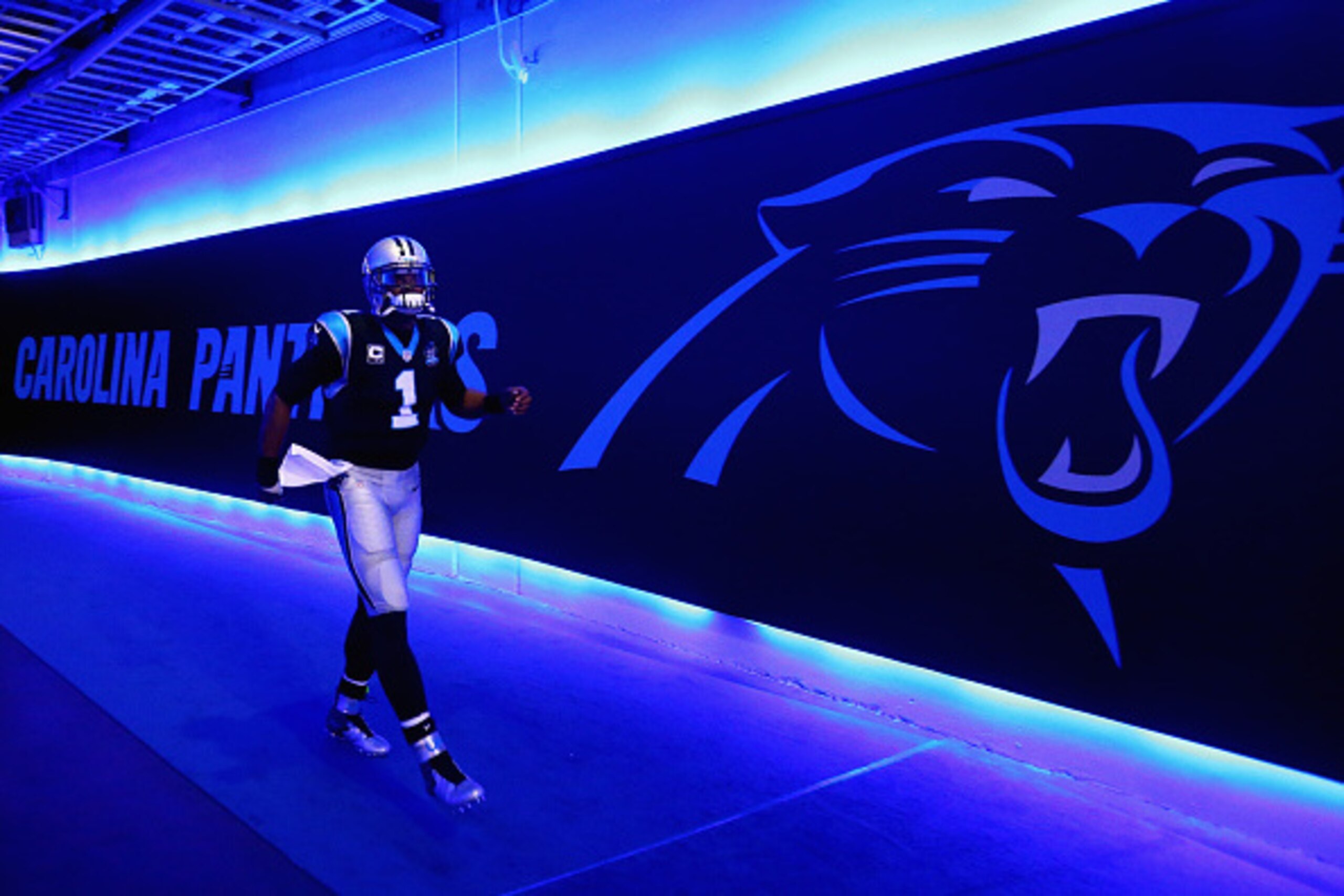 CHARLOTTE, NC - OCTOBER 26:   Cam Newton #1 of the Carolina Panthers runs out to be introduced before their game against the Seattle Seahawks at Bank of America Stadium on October 26, 2014 in Charlotte, North Carolina.  (Photo by Streeter Lecka/Getty Imag