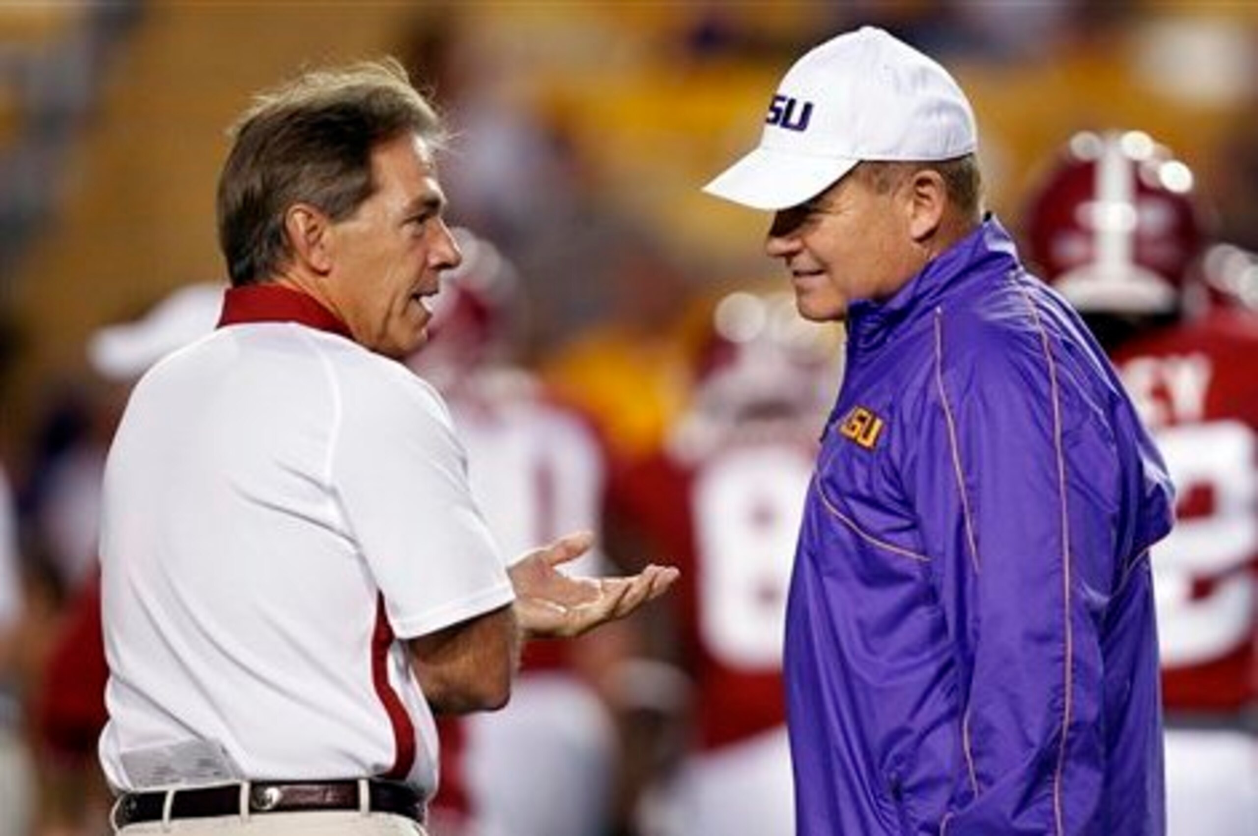 Alabama head coach Nick Saban (left) and LSU head coach Les Miles (right)