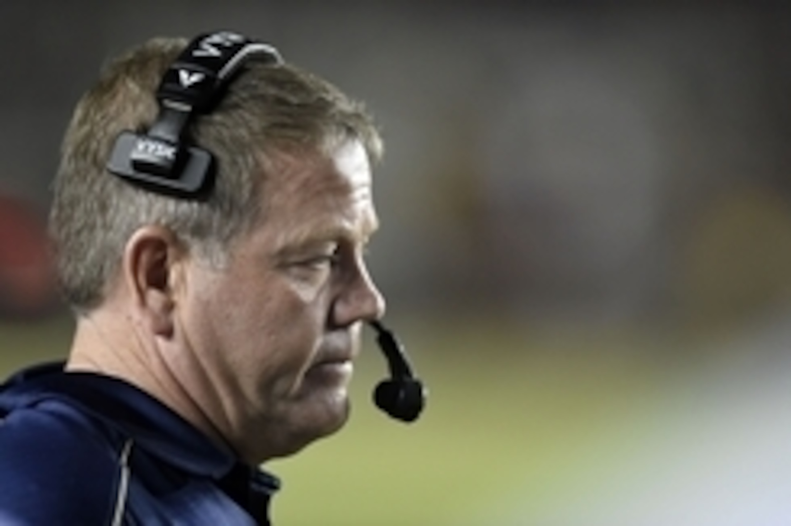Oct 18, 2014; Tallahassee, FL, USA; Notre Dame Fighting Irish head coach Brian Kelly reacts from the sidelines after a series of downs against the Florida State Seminoles during the first quarter at Doak Campbell Stadium. Mandatory Credit: John David Merc