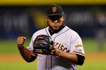 KANSAS CITY, MO - OCTOBER 28:  Jean Machi #63 of the San Francisco Giants reacts in the fourth inning against the Kansas City Royals during Game Six of the 2014 World Series at Kauffman Stadium on October 28, 2014 in Kansas City, Missouri.  (Photo by Elsa