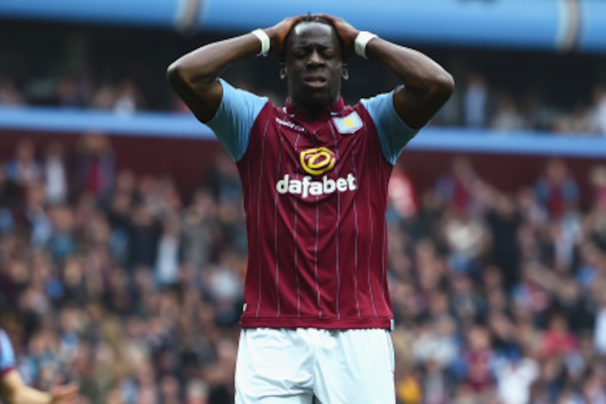 BIRMINGHAM, ENGLAND - SEPTEMBER 20: Aly Cissokho of Aston Villa reacts during the Barclays Premier League match between Aston Villa and Arsenal at Villa Park on September 20, 2014 in Birmingham, England.  (Photo by Shaun Botterill/Getty Images)