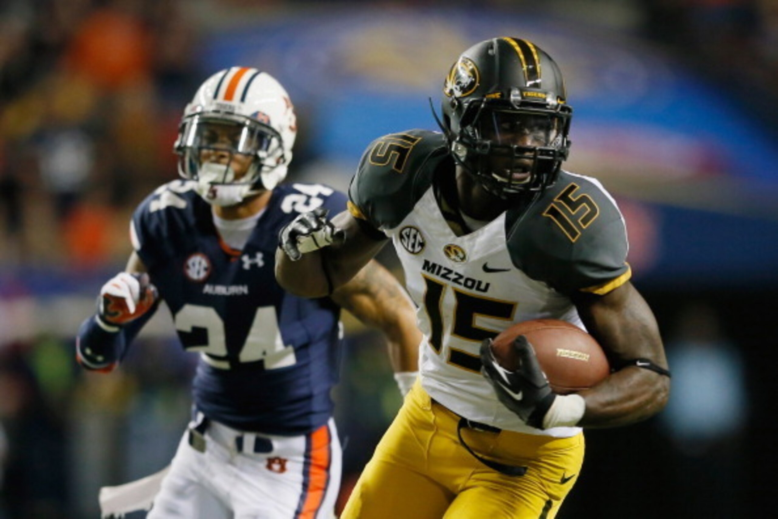 ATLANTA, GA - DECEMBER 07:  Dorial Green-Beckham #15 of the Missouri Tigers runs a touchdown reception against Ryan Smith #24 of the Auburn Tigers in the second quarter during the SEC Championship Game at Georgia Dome on December 7, 2013 in Atlanta, Georg