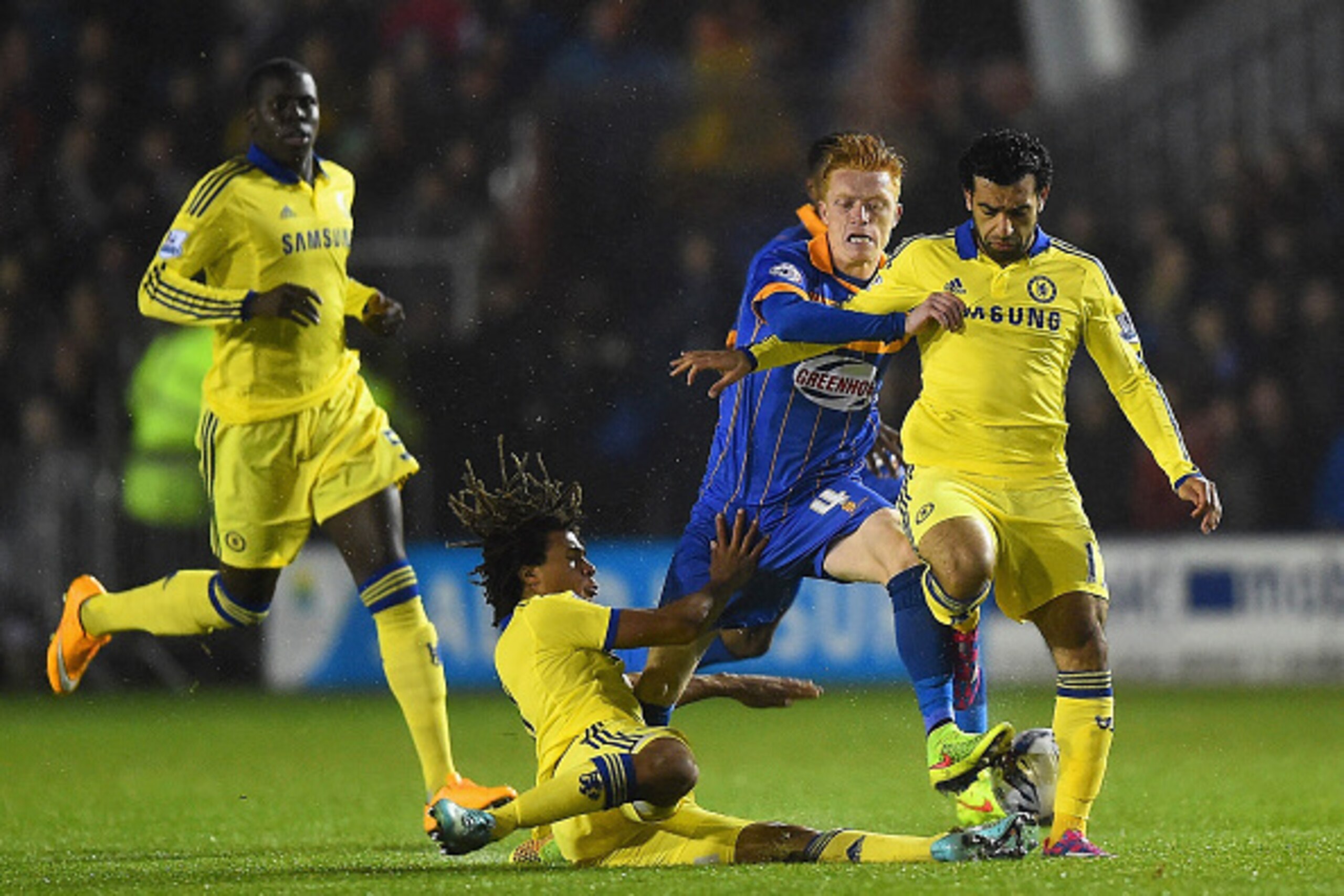 SHREWSBURY, ENGLAND - OCTOBER 28: Nathan Ake (L) and Mohamed Salah of Chelsea close down Ryan Woods of Shrewsbury Town during the Capital One Cup Fourth Round match between Shrewsbury Town and Chelsea at Greenhous Meadow on October 28, 2014 in Shrewsbury SHREWSBURY, ENGLAND - OCTOBER 28: Nathan Ake (L) and Mohamed Salah of Chelsea close down Ryan Woods of Shrewsbury Town during the Capital One Cup Fourth Round match between Shrewsbury Town and Chelsea at Greenhous Meadow on October 28, 2014 in Shrewsbury