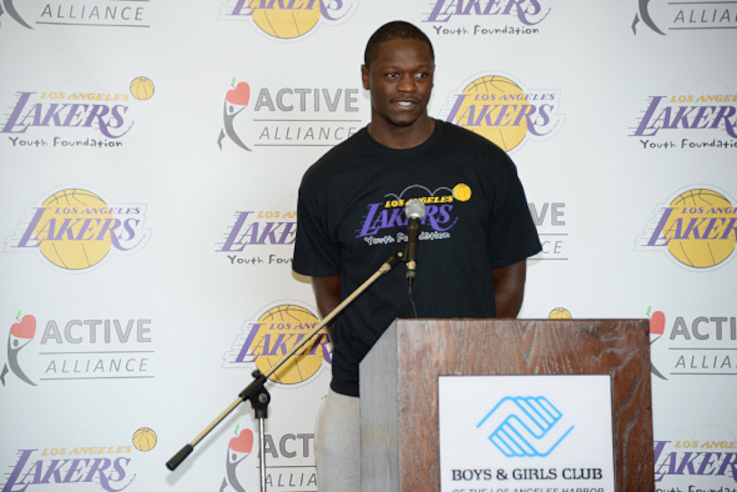 SAN PEDRO, CA - OCTOBER 27, 2014: Julius Randle #30 of the Los Angeles Lakers speaks at the Los Angeles Lakers Youth Foundation and Active Alliance in San Pedro, CA on October 27, 2014.  NOTE TO USER: User expressly acknowledges and agrees that, by downlo
