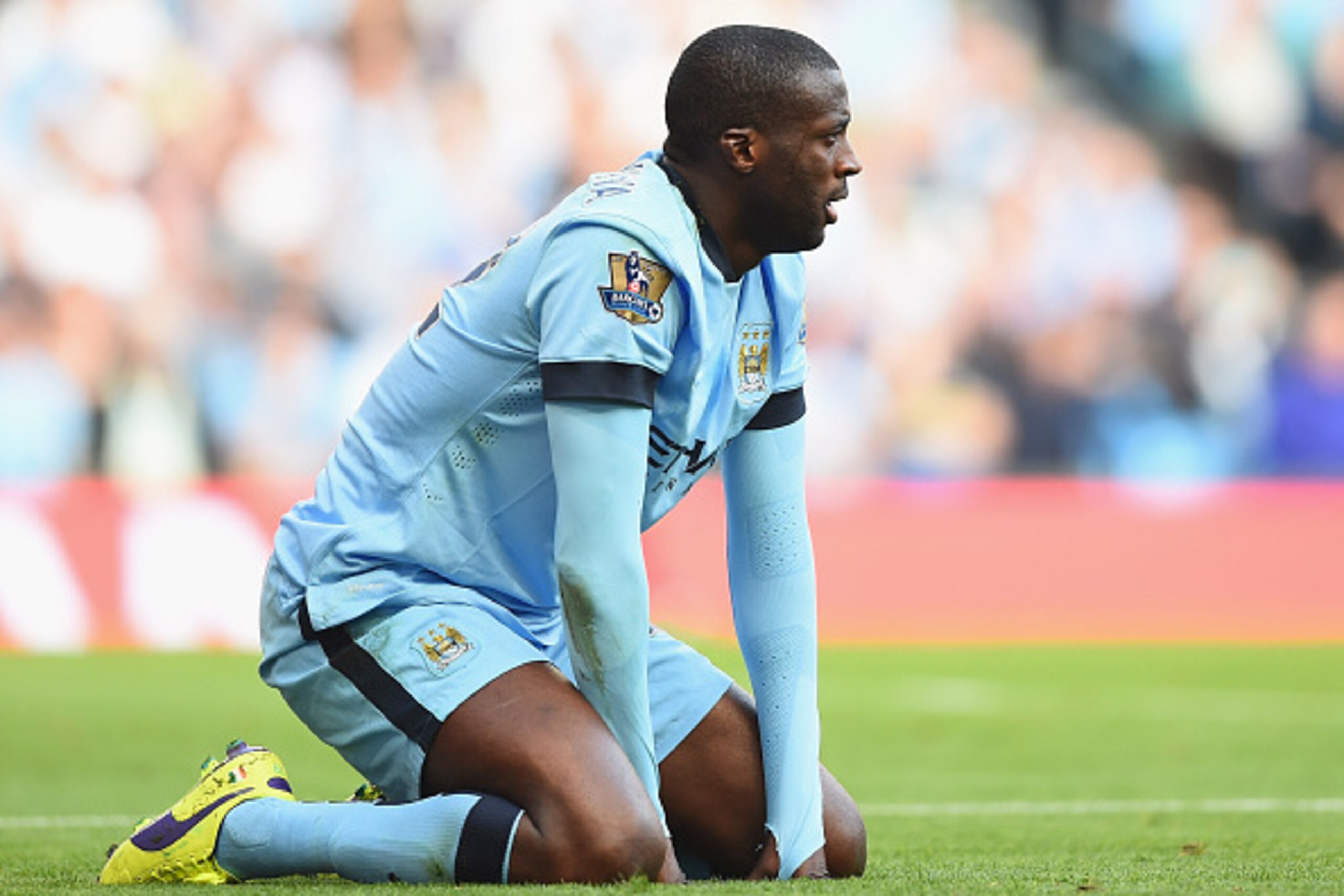 MANCHESTER, ENGLAND - SEPTEMBER 21:  Yaya Toure of Manchester City reacts during the Barclays Premier League match between Manchester City and Chelsea at Etihad Stadium on September 21, 2014 in Manchester, England.  (Photo by Laurence Griffiths/Getty Imag