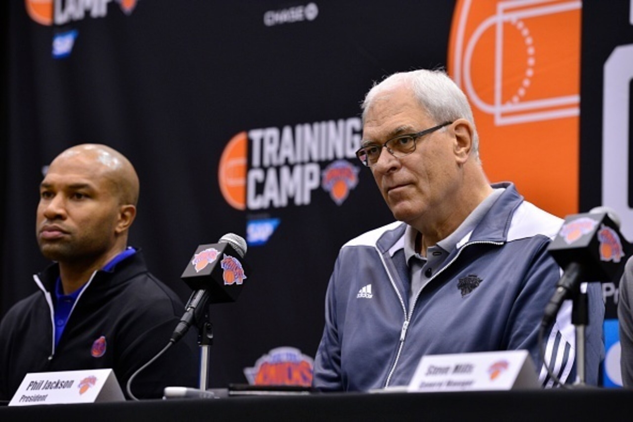 TARRYTOWN, NY - SEPTEMBER 26:  The New York Knicks host a press conference with Head Coach Derek Fisher, Team President Phil Jackson and Team General Manager Steve Mills on September 26, 2014 in Tarrytown, New York. NOTE TO USER: User expressly acknowledg