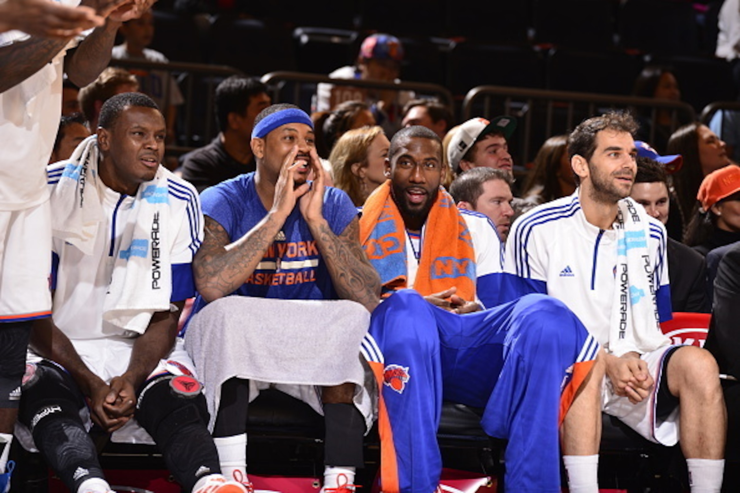 NEW YORK, NY - OCTOBER 13:  Carmelo Anthony #7 of the New York Knicks cheers for his teammates during a game against the Toronto Raptors at Madison Square Garden on October 13, 2014 in New York City, New York. NOTE TO USER: User expressly acknowledges and