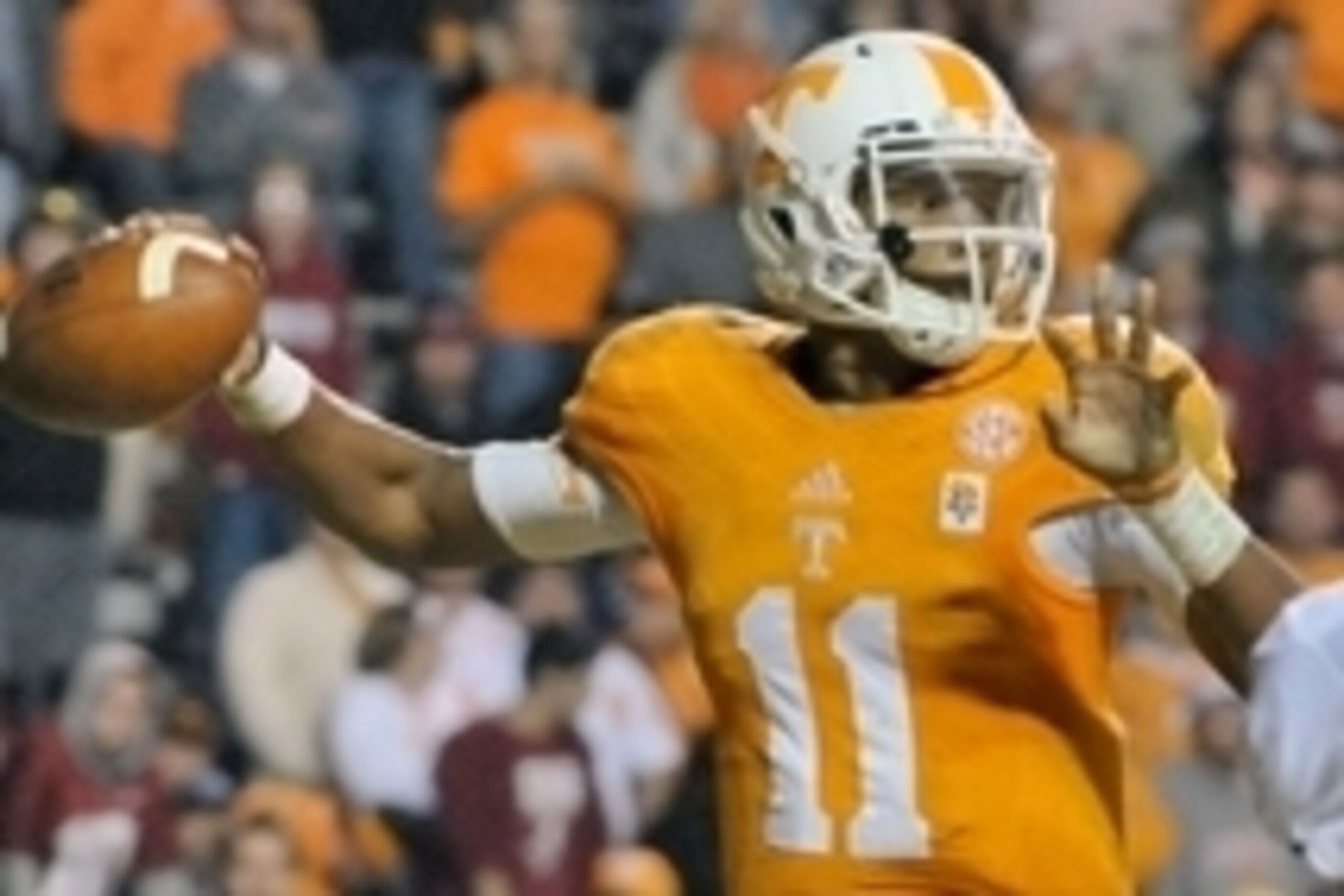 Oct 25, 2014; Knoxville, TN, USA; Tennessee Volunteers quarterback Joshua Dobbs (11) passes against the Alabama Crimson Tide during the second half game at Neyland Stadium. Alabama won 34-20. Mandatory Credit: Jim Brown-USA TODAY Sports