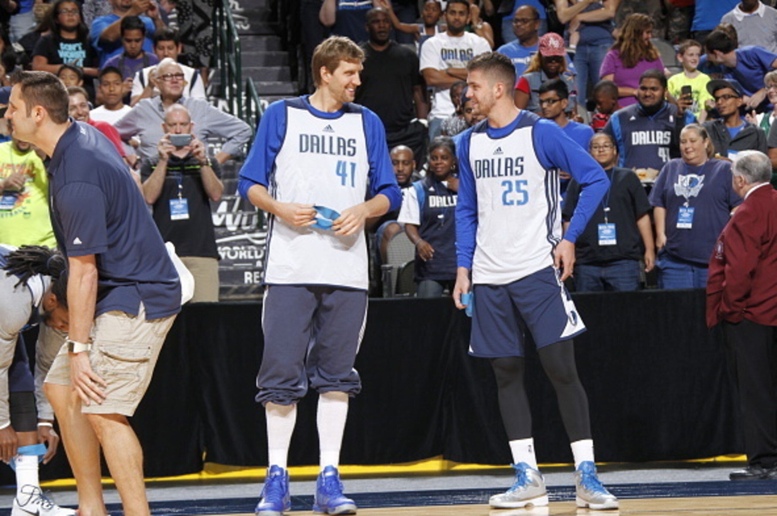 DALLAS, TX - OCTOBER 4: Dirk Nowitzk #41 and Chandler Parsons #25 of the Dallas Mavericks prepare to warm up during the Dallas Mavericks 'Fan Jam' on October 4, 2014 at the American Airlines Center in Dallas, Texas. NOTE TO USER: User expressly acknowledg