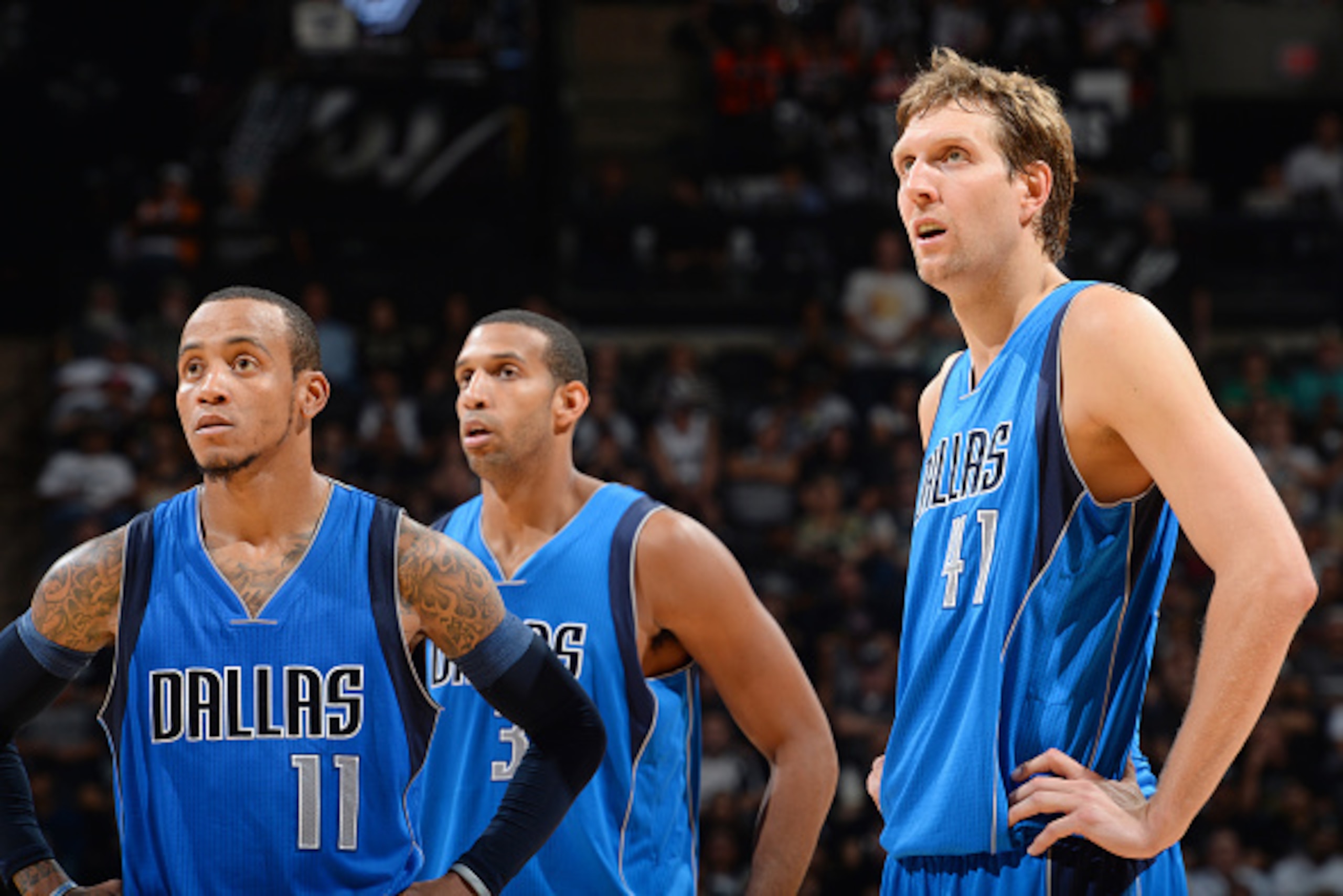 SAN ANTONIO, TX - OCTOBER 28: Monta Ellis #11, Charlie Villanueva #3 and Dirk Nowitzki #41 of the Dallas Mavericks  during the game against the San Antonio Spurs on October 28, 2014 at the AT&T Center in San Antonio,Texas. NOTE TO USER: User expressly ack