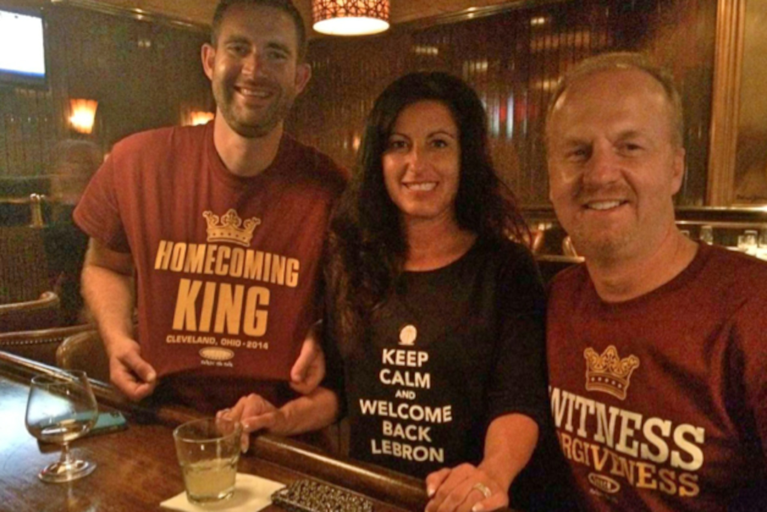 With the help of friends Kyle (left) and Wayne, Jennifer Burkhart made a personal pilgrimage to apologize to LeBron James.