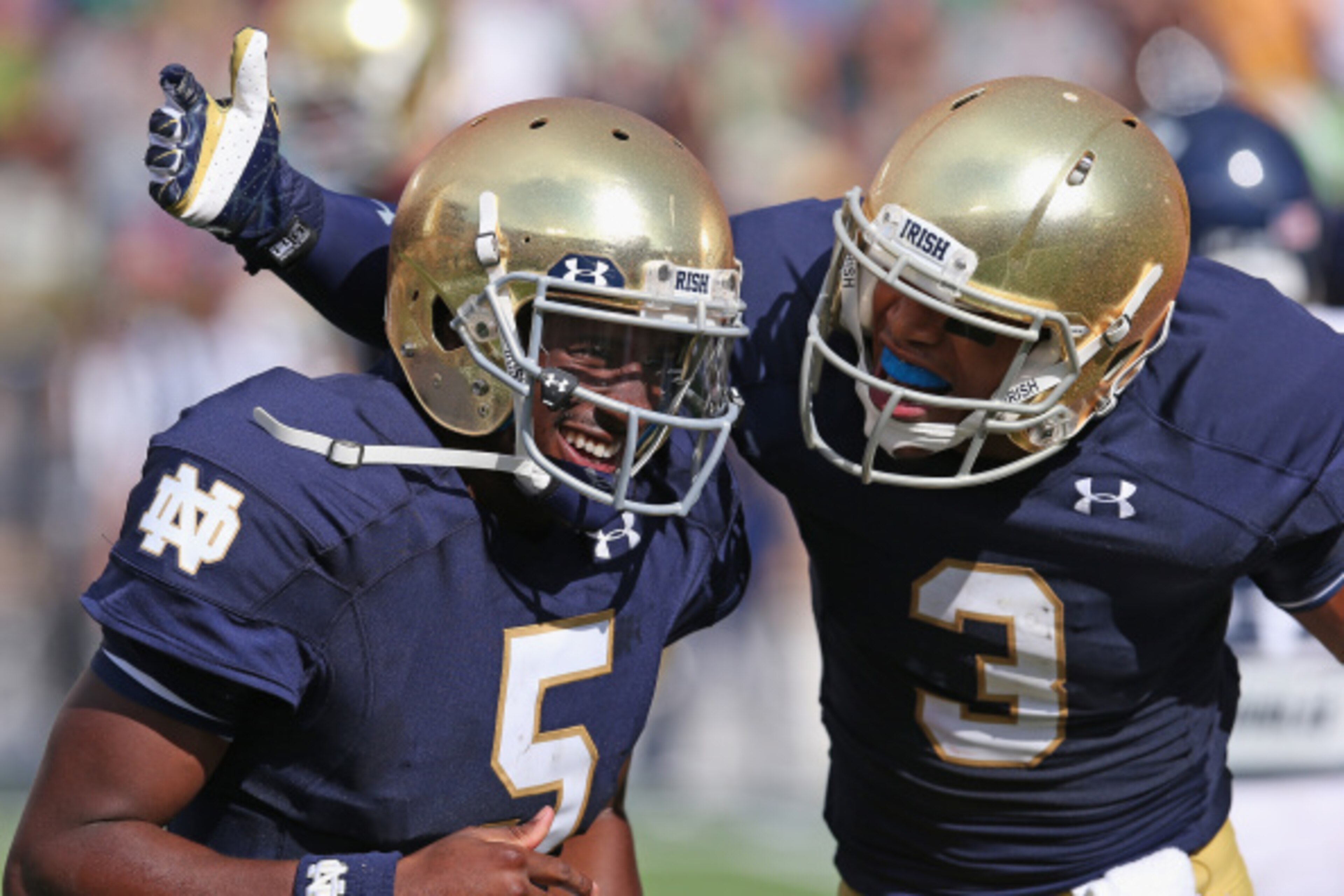 SOUTH BEND, IN - AUGUST 30: Everett Golson #5 and Amir Carilisle #3 of the Norte Dame Fighting Irish celebrate Golson's second quarter touchdown against the Rice Owls at Notre Dame Stadium on August 30, 2014 in South Bend, Indiana. (Photo by Jonathan Da SOUTH BEND, IN - AUGUST 30: Everett Golson #5 and Amir Carilisle #3 of the Norte Dame Fighting Irish celebrate Golson's second quarter touchdown against the Rice Owls at Notre Dame Stadium on August 30, 2014 in South Bend, Indiana. (Photo by Jonathan Da